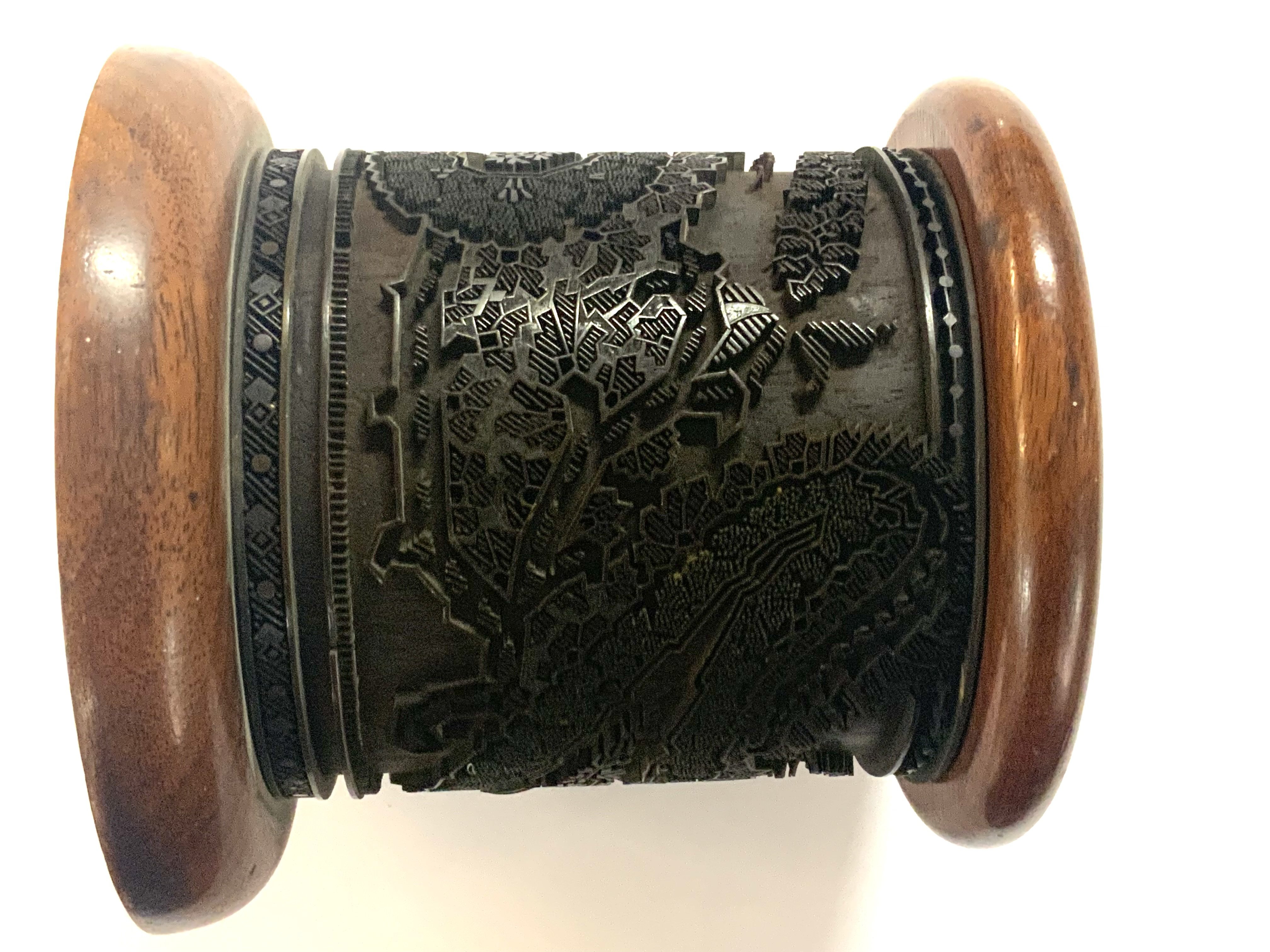 A mid 20th Century Chinese cylinder printing block with impressed steel cut design. 14cm x 14cm