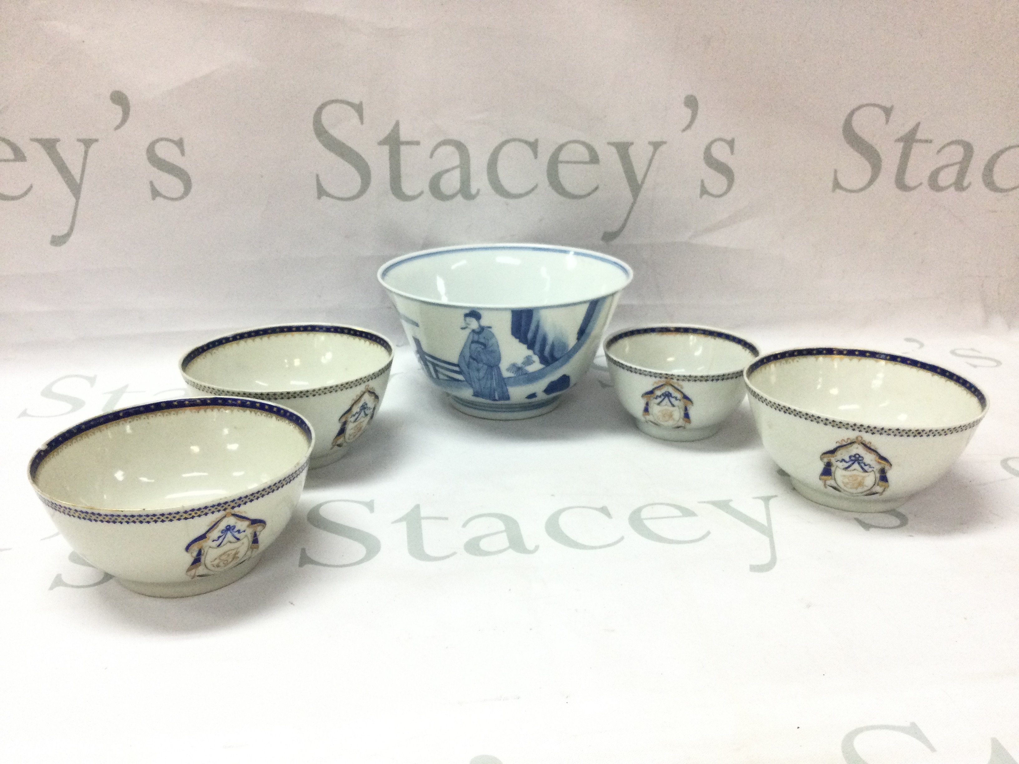 Chinese export armorial porcelain bowls (hairline cracks seen) and a blue and white figure scene bowl. This lot cannot be posted