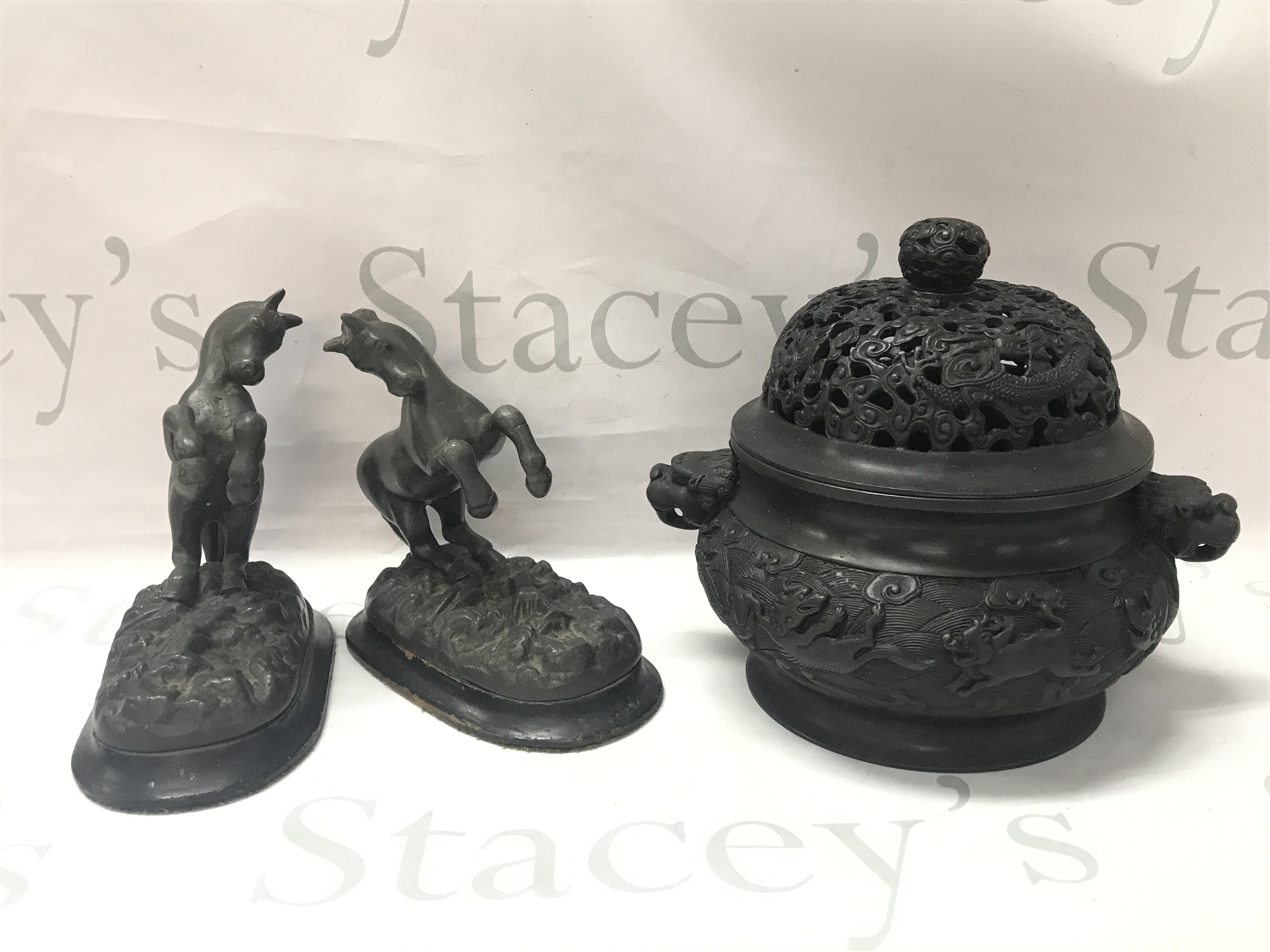A Chinese bronze censor with dragon/animal design (21cm tall) and a six character mark at the base and a pair of bronze rearing horse figures (17cm tall). Postage catC