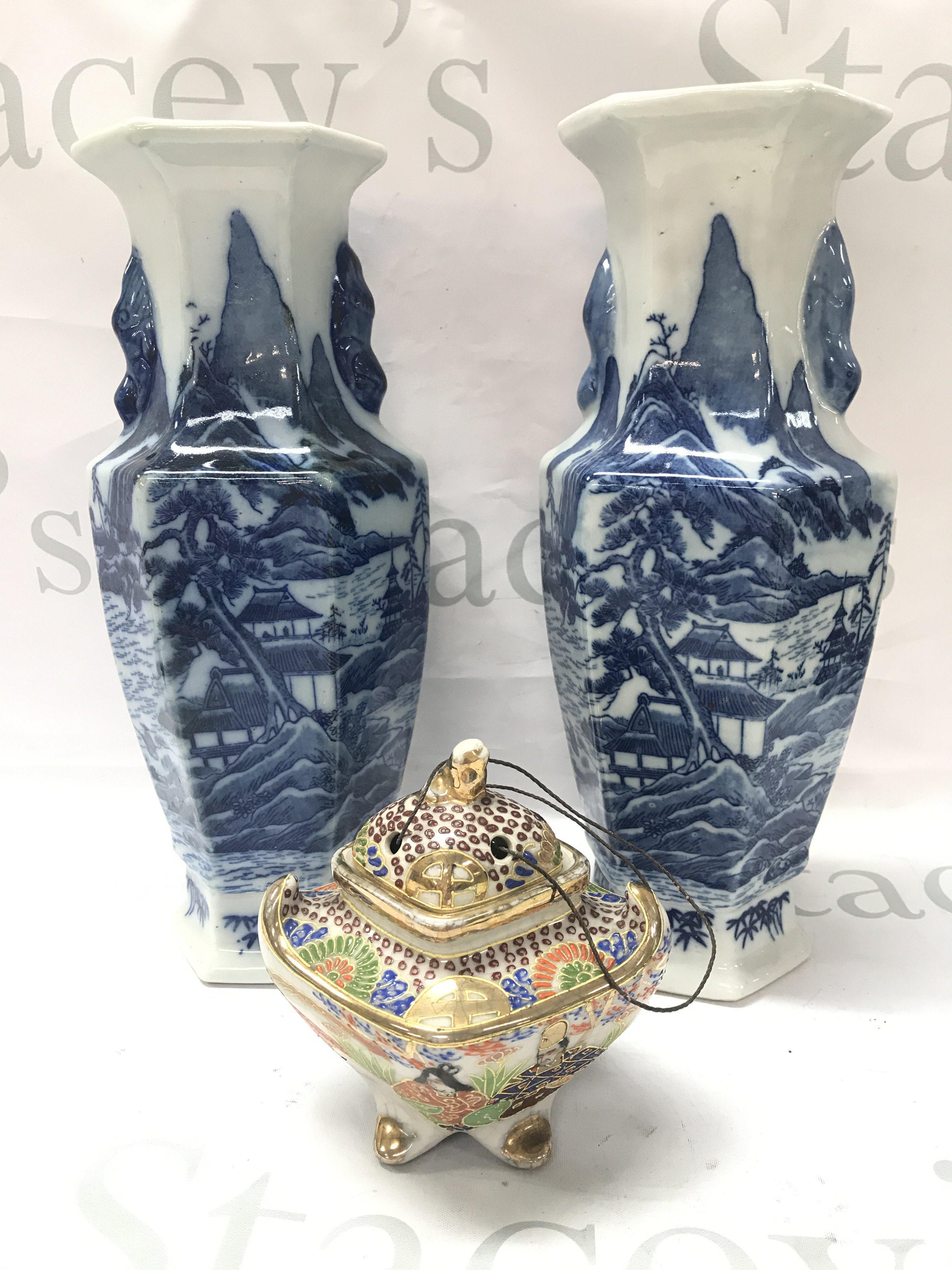 A pair of 20th century Japanese blue and white vases (29cm tall) and an incense burner, this lot cannot be posted