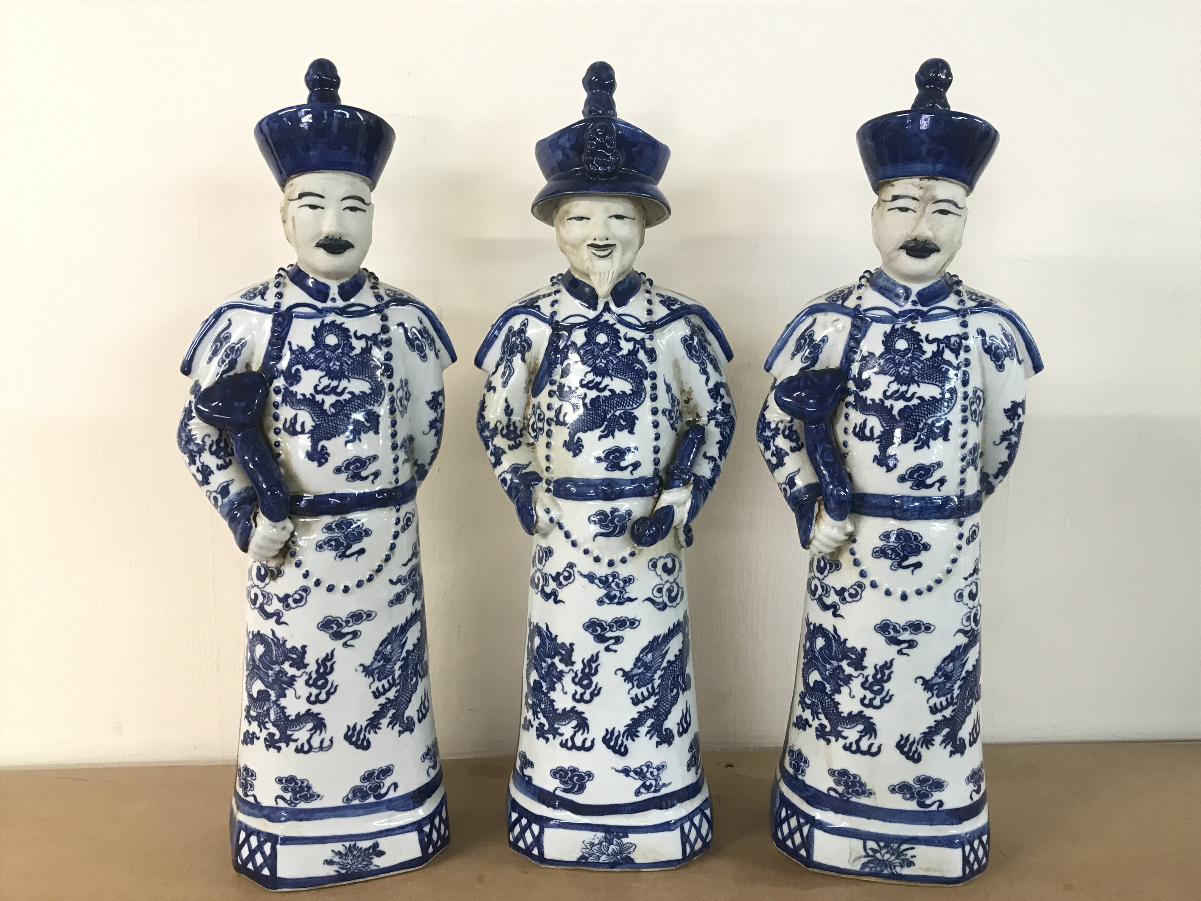 Chinese blue and white three standing Ching Qing Emperors , 43cm tall. This lot cannot be posted