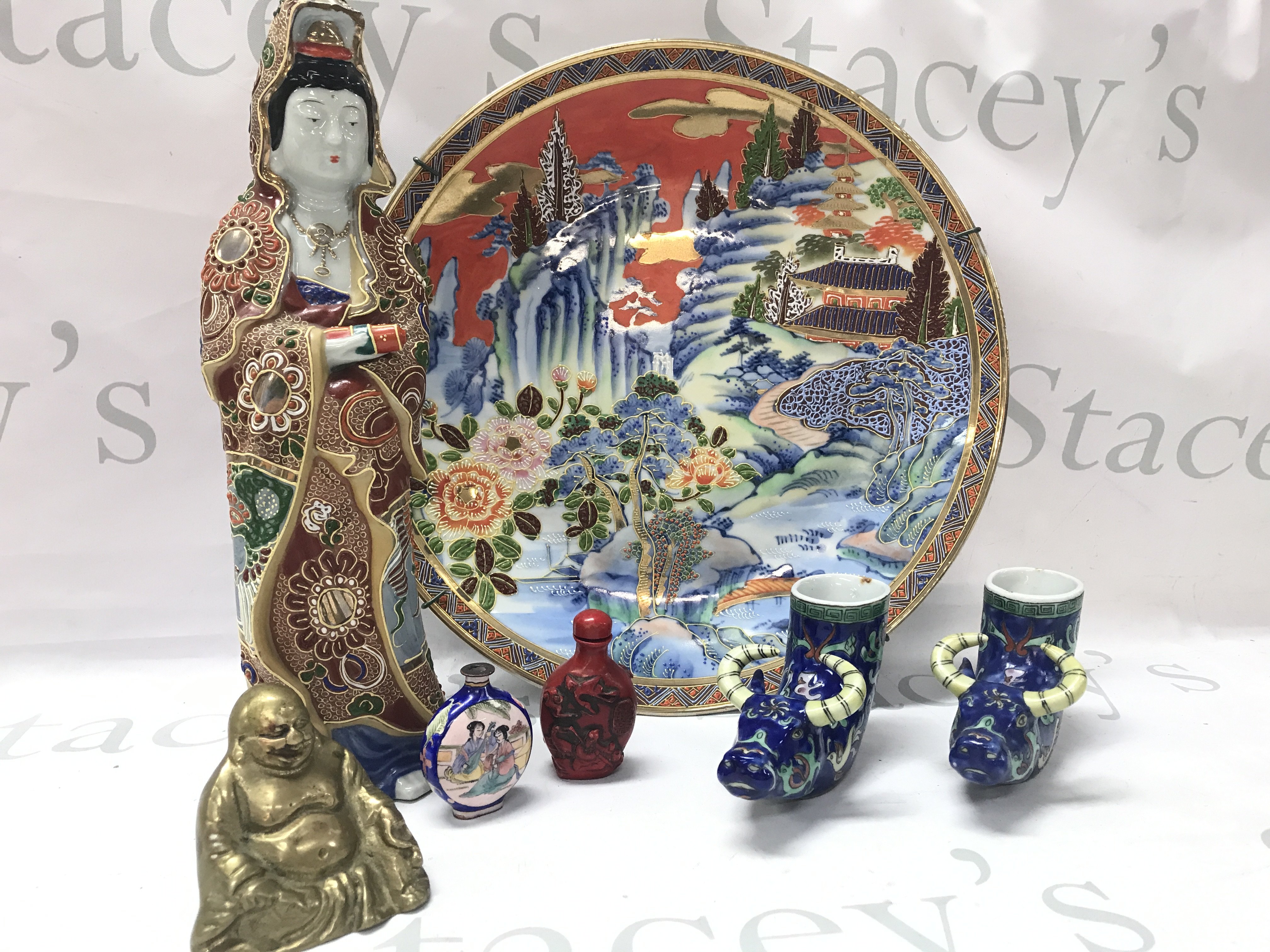 Oriental items including a pair of porcelain liberation cups , figure etc . This lot cannot be posted