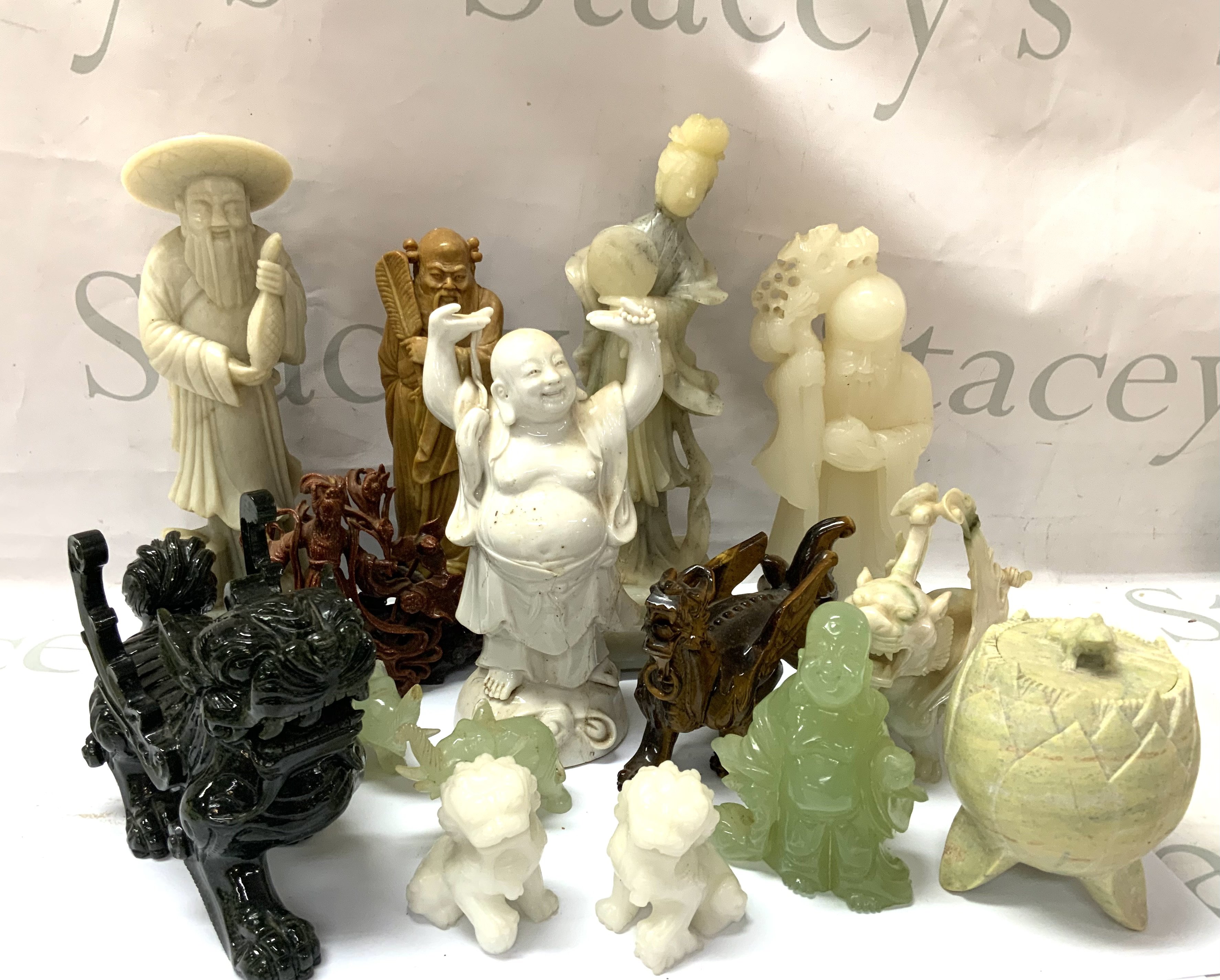 A collection of Oriental figures of Porcelain, Jadeite, Soapstone, Goldstone etc&hellip;