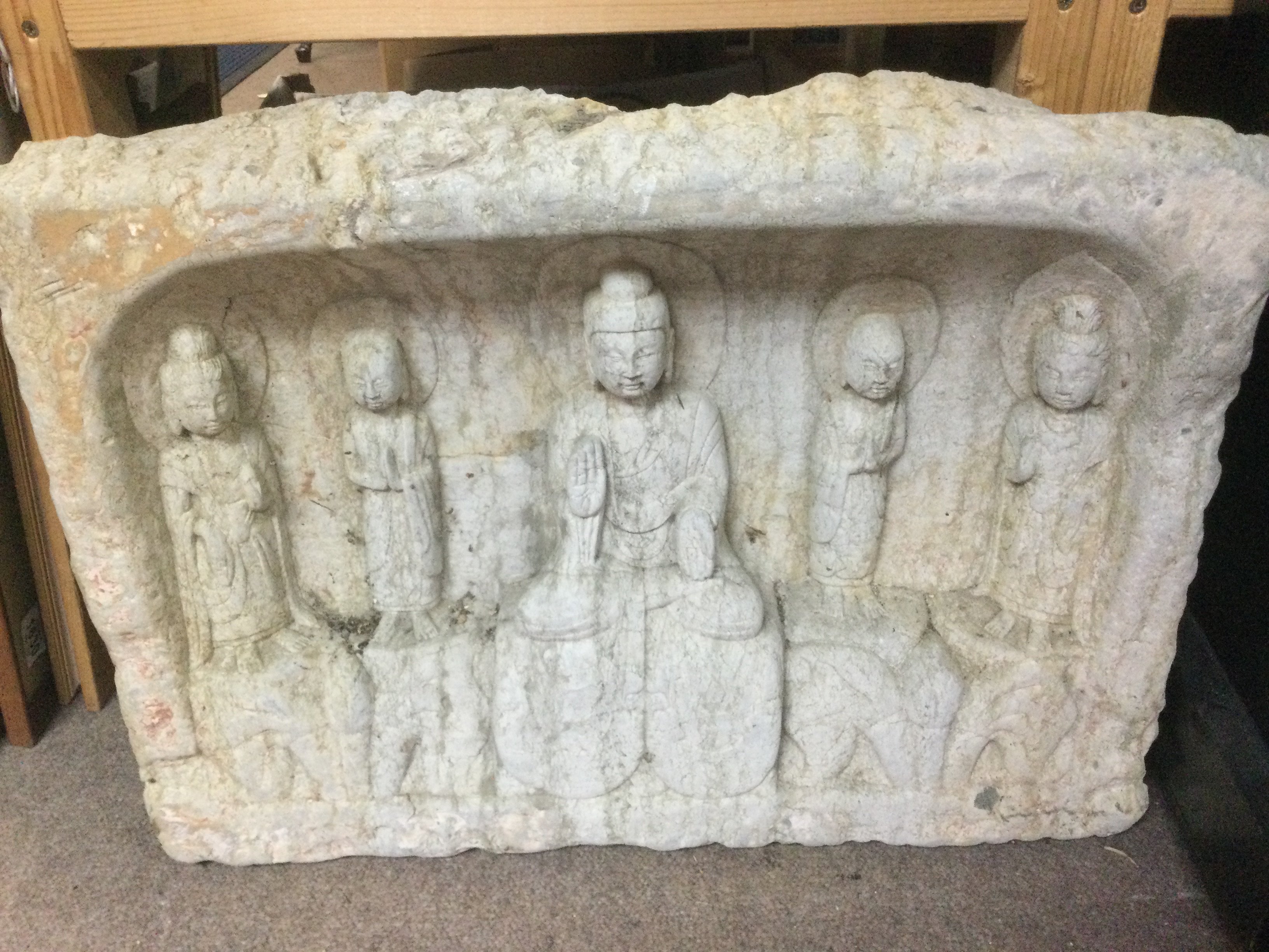A Chinese stone cut plaque of buddha and disciples, approx 62cm x 44cm. Shipping category D.