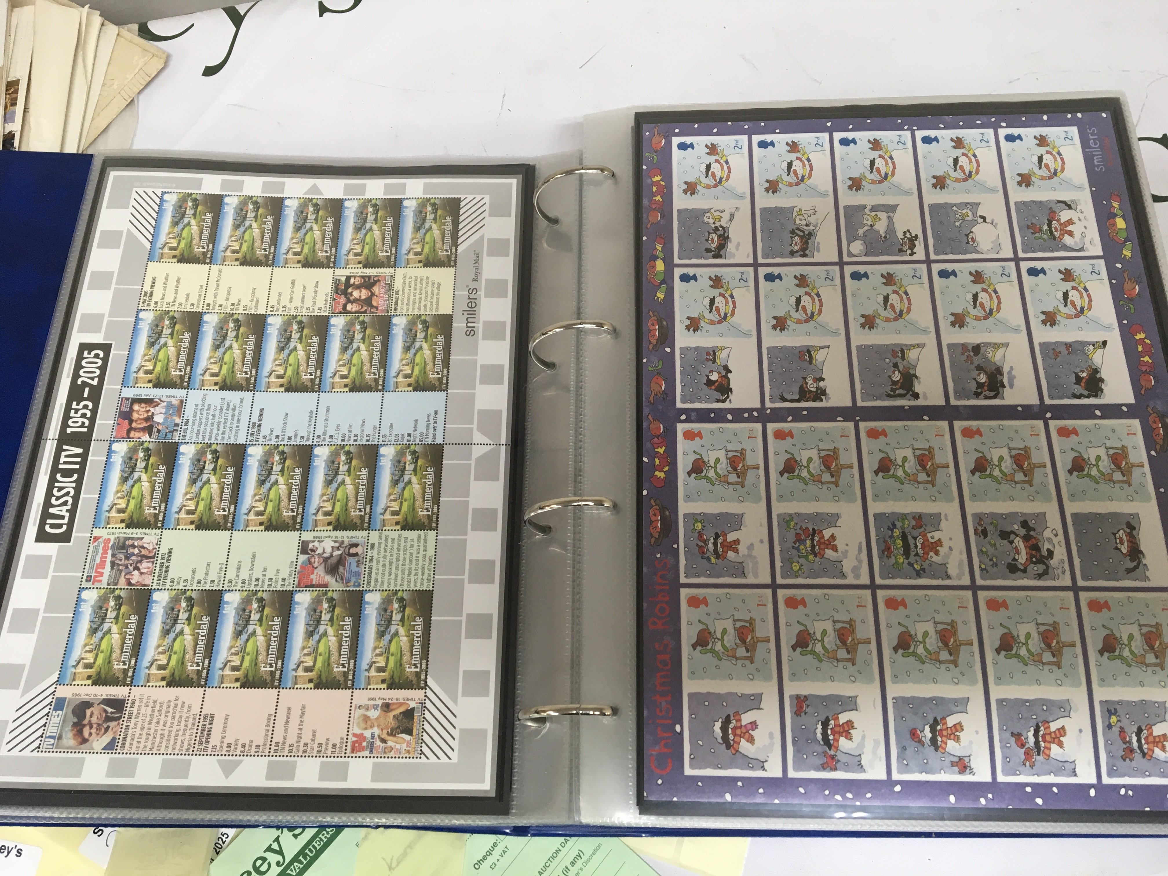 An album containing excess of 70 British Royal Mail Pictorial stamp sheets predominantly First class each sheet with 10 or more stamps some double sheets. All in very good unused condition.