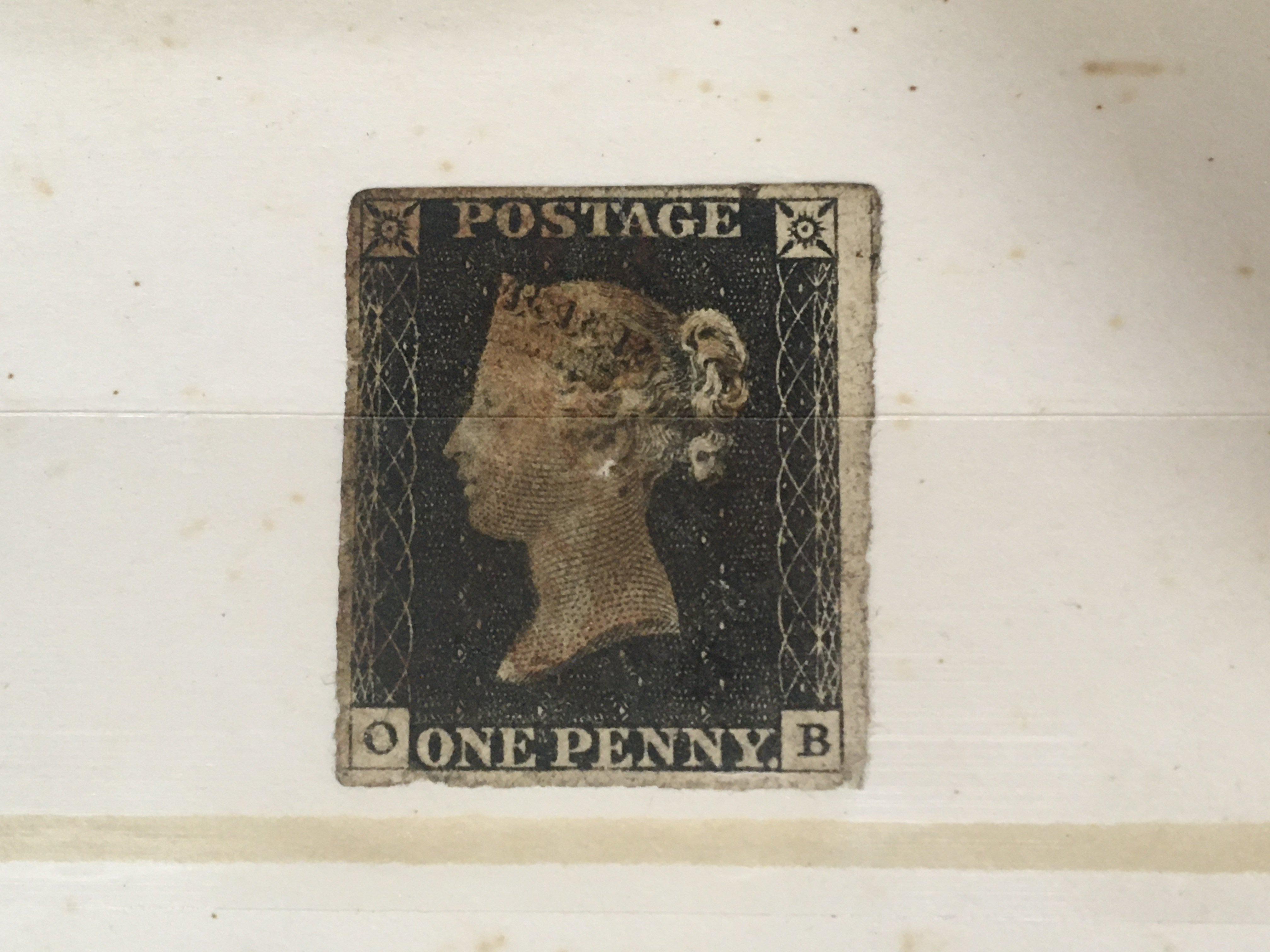 A red stock book containing a good selection of British stamps from 1840-to Elizabeth II decimal including 1840 penny black other Victorian Edward VII George V stamps mainly used.