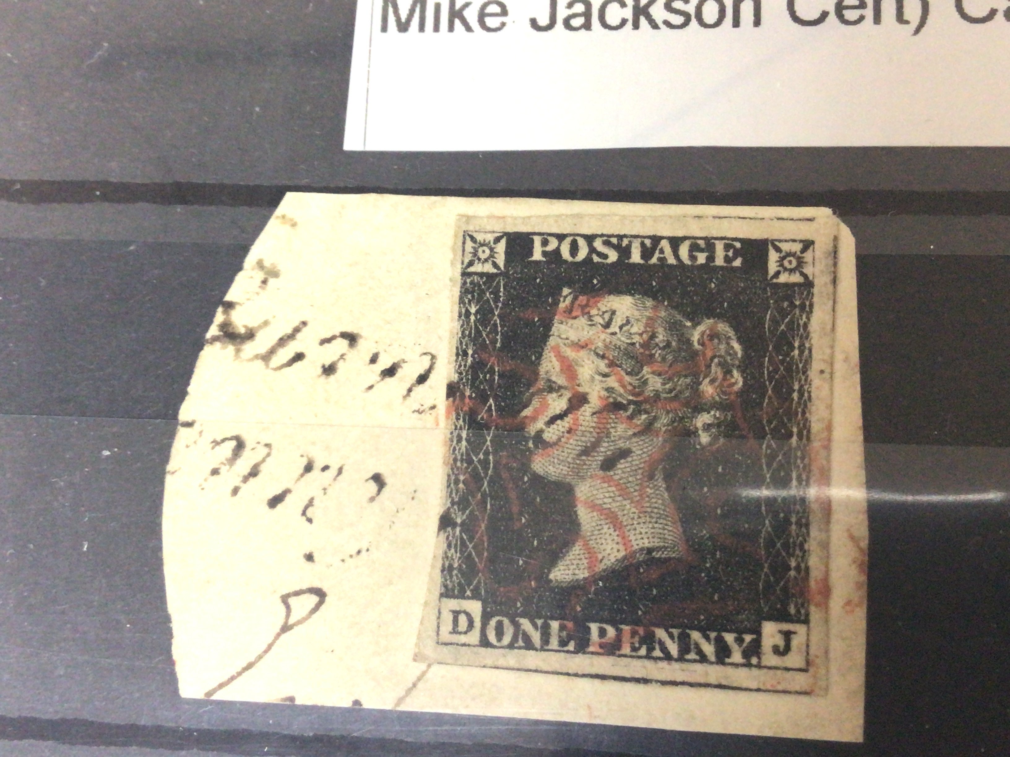 A good example of a plate 4 D-J Penny black stamp with certificate of authenticity.