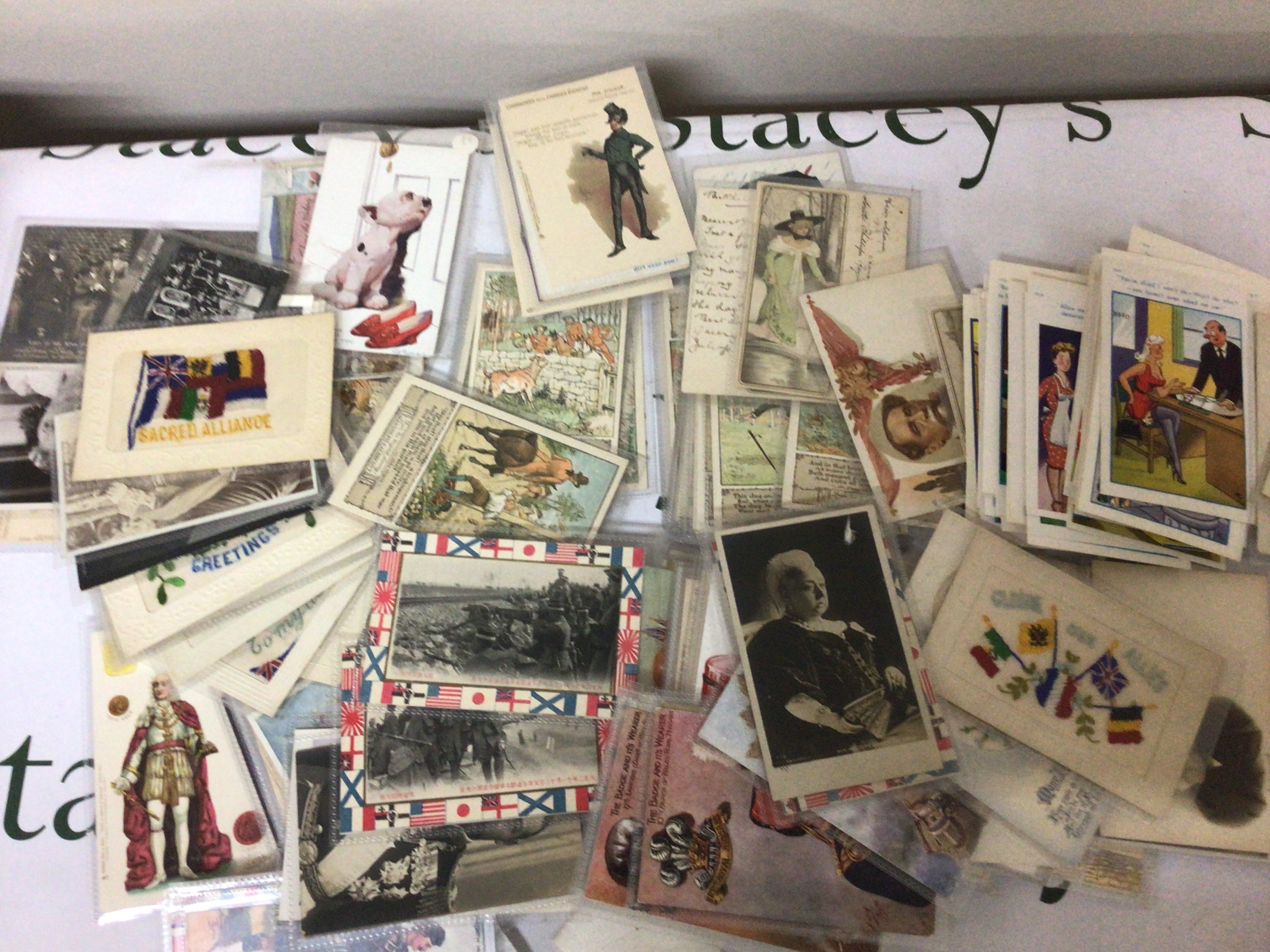 A good collection of Vintage postcards most in plastic sleeves including embroidered I World war postcards unusual Chinese I world war Postcard British Royalty Randolph Caldecotts picture cards Commercial cards and manny others.