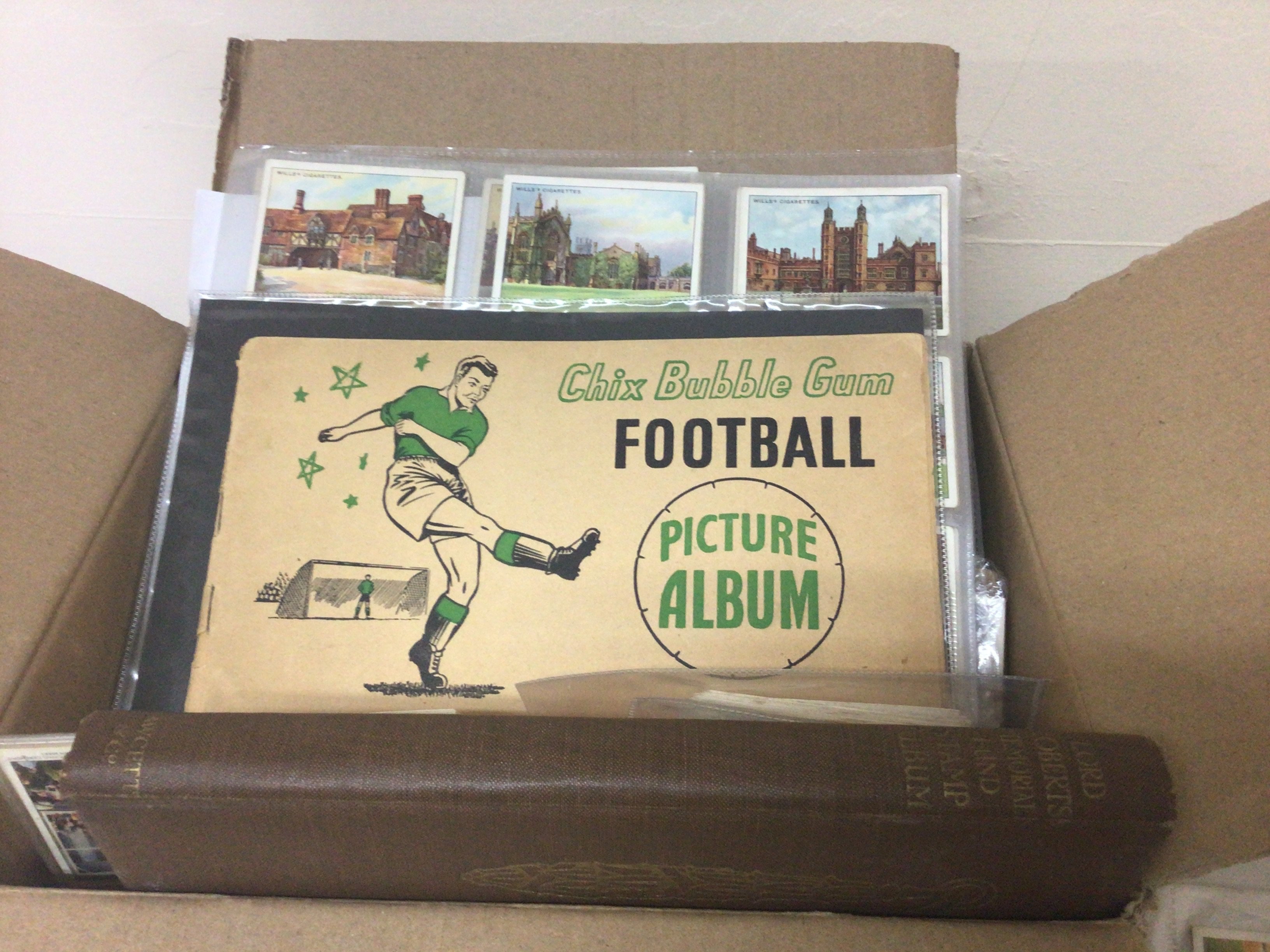A box containing Vintage cigarette cards including Chix Bubble Gum cards and an album and many other cards many well presented in plastic sleeves.