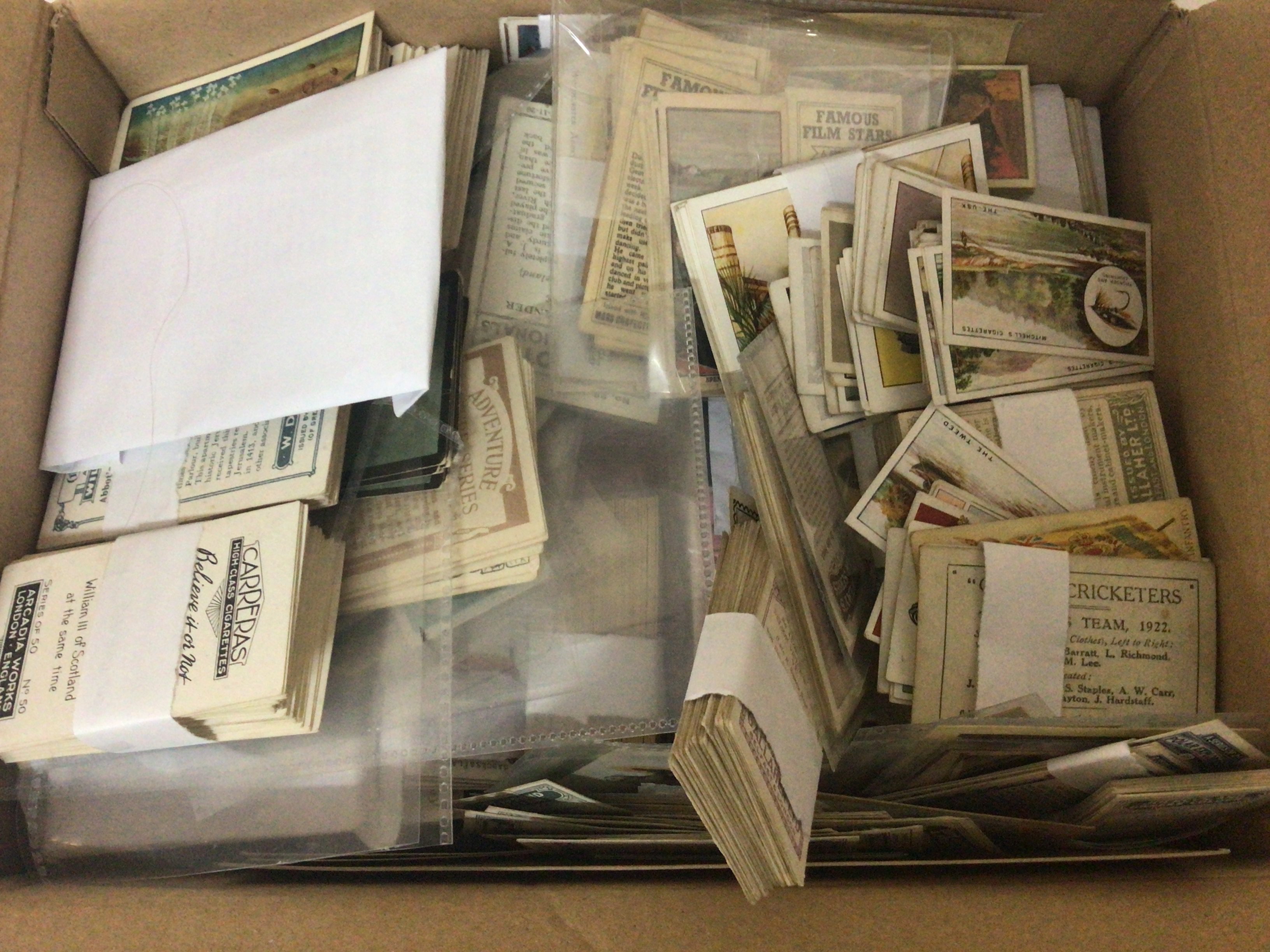 Two boxes containing a collection of Modern and Vintage cigarette and other collectors cards including Comic Image Beatles Classic cars Vintage John Sinclair football cards boxed Space Shots Thrilling Scence from the Great War and many others sets and part sets. (2)