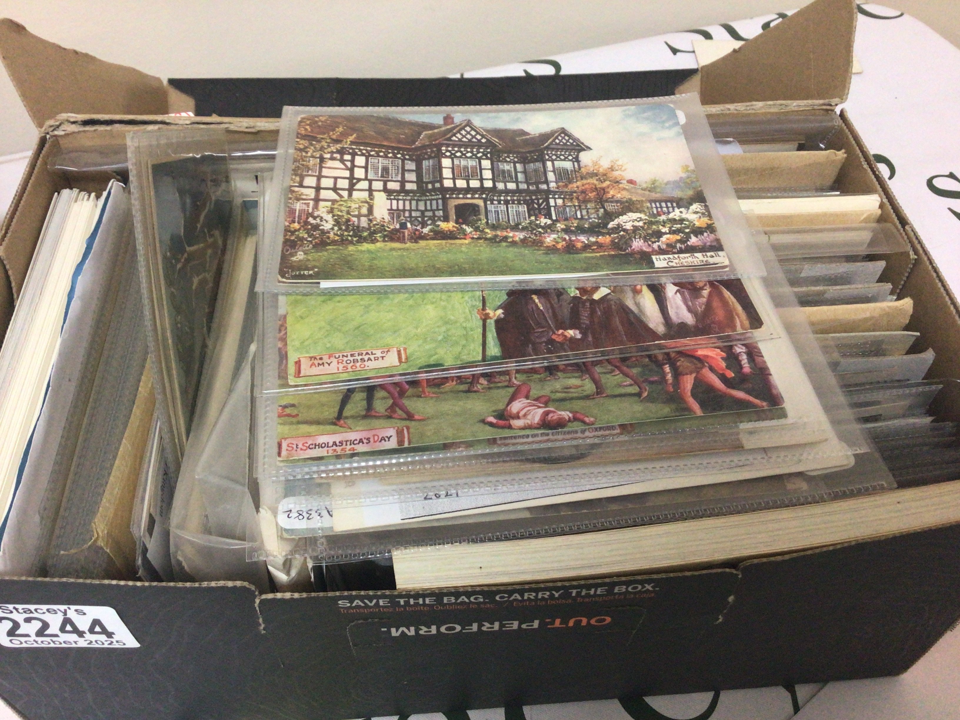 A box containing mixed Vintage postcards Tuck Post Cards C W Faulkerner cards and many others and a box containing modern mixed collectors cards including American cards Greatest Olympians and many others. Including football cards. (2)