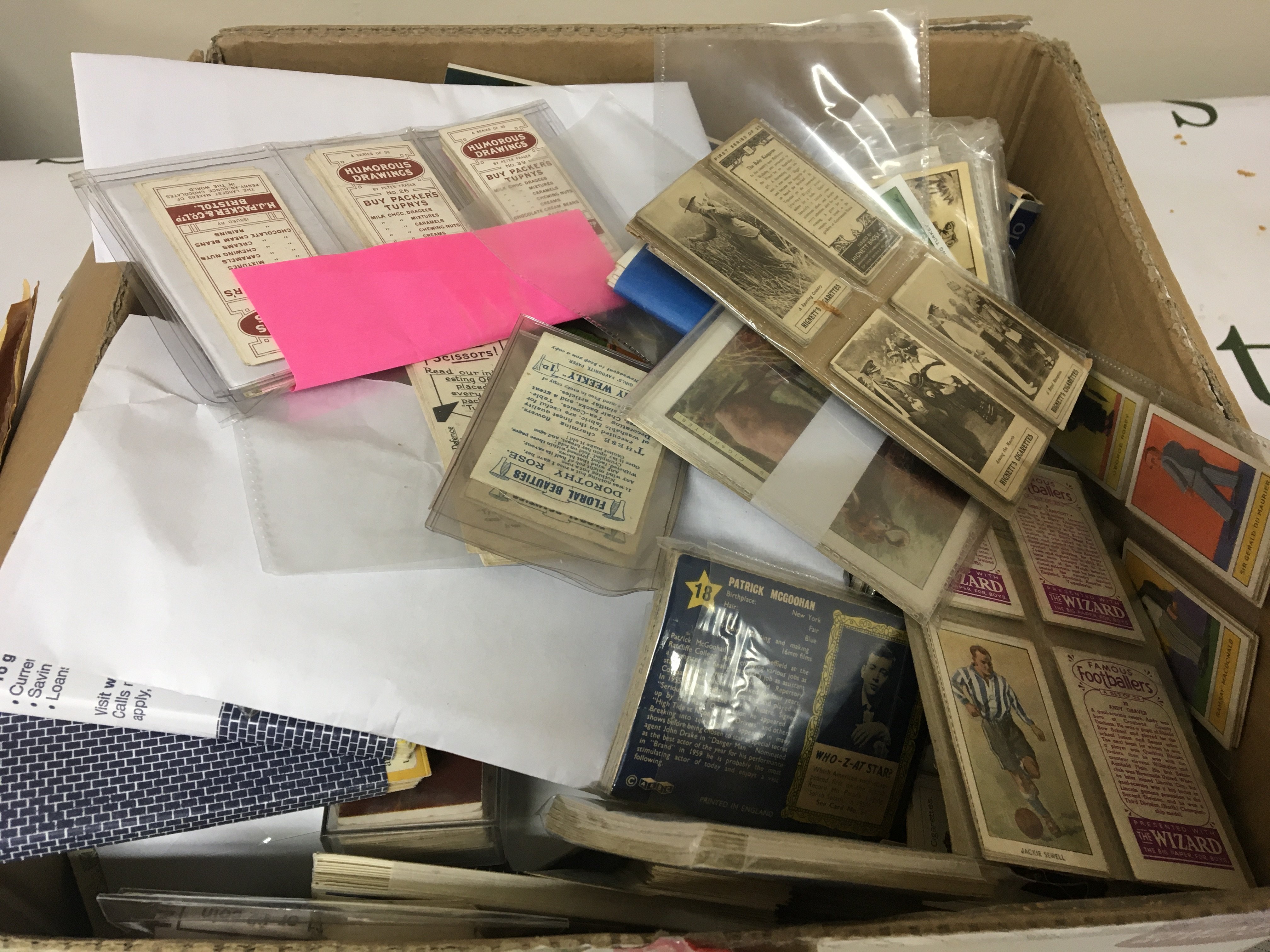 A box containing a large quantity of vintage cigarette cards some Vintage ABC cards Wizards famous footballers and many others.