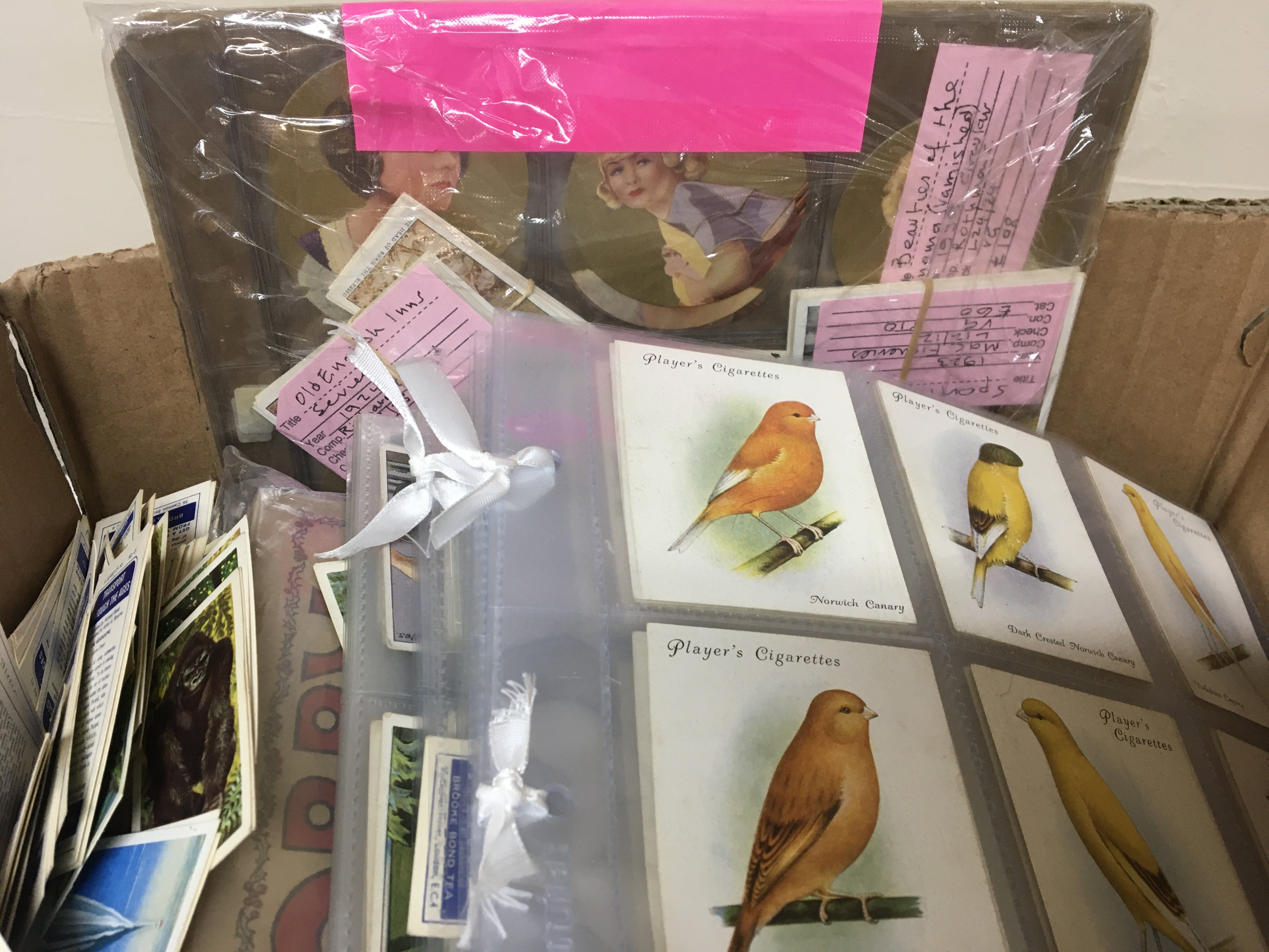 A Box containing a collection of cigarette cards including 1939 round cards 1939 Beauties of the Cinema English league football captains large size Players Aviary and Cage birds.