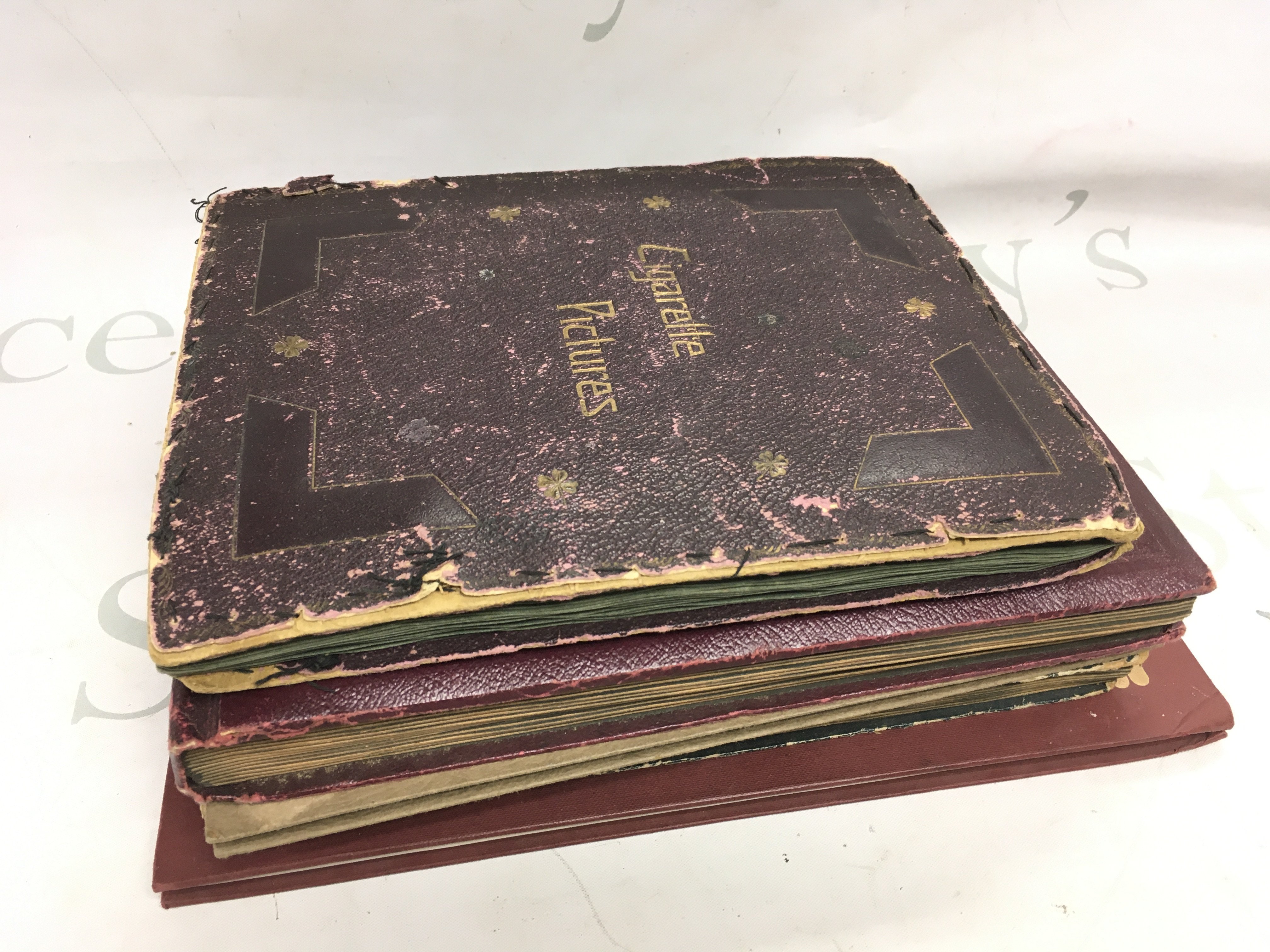 Five albums of mixed cigarette cards including Wills, Players etc. postage category B