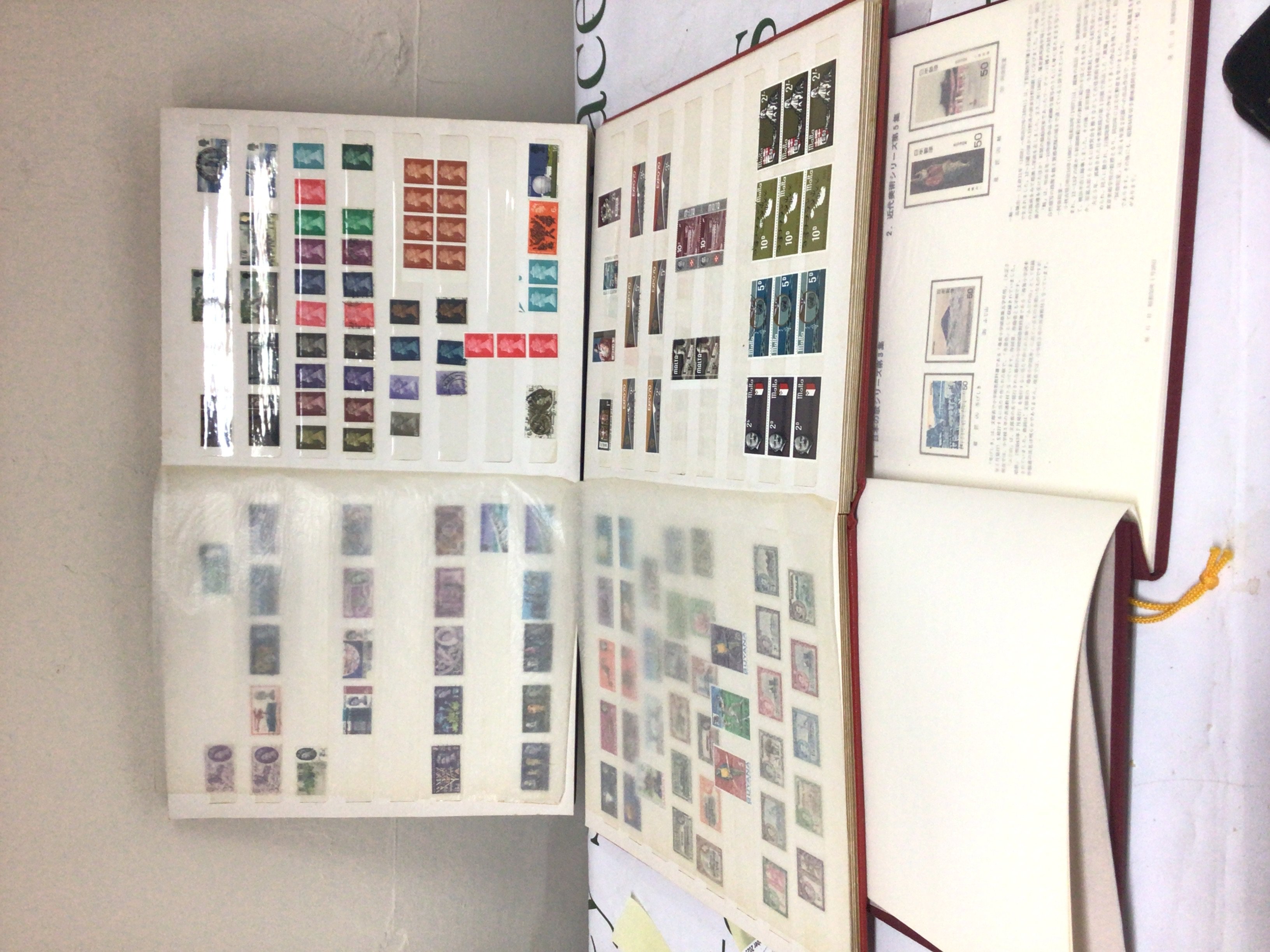 Five albums of stamps and other loose stamps including a presentation album of Japanese stamps other world stamps a collection of Elizabeth II stamps including unused pre-decimal Commonwealth and British colonial stamps.