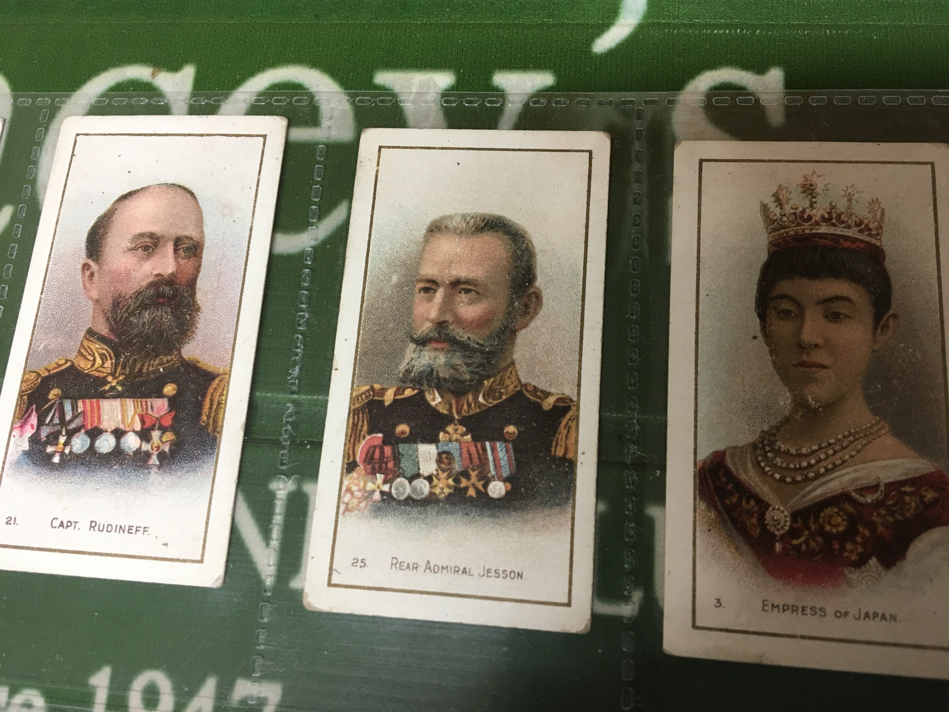 A box containing a large quantity of vintage cigarette cards and other cards and ephemera including some Taddy & Co Cards and numerous others in unopened packs.