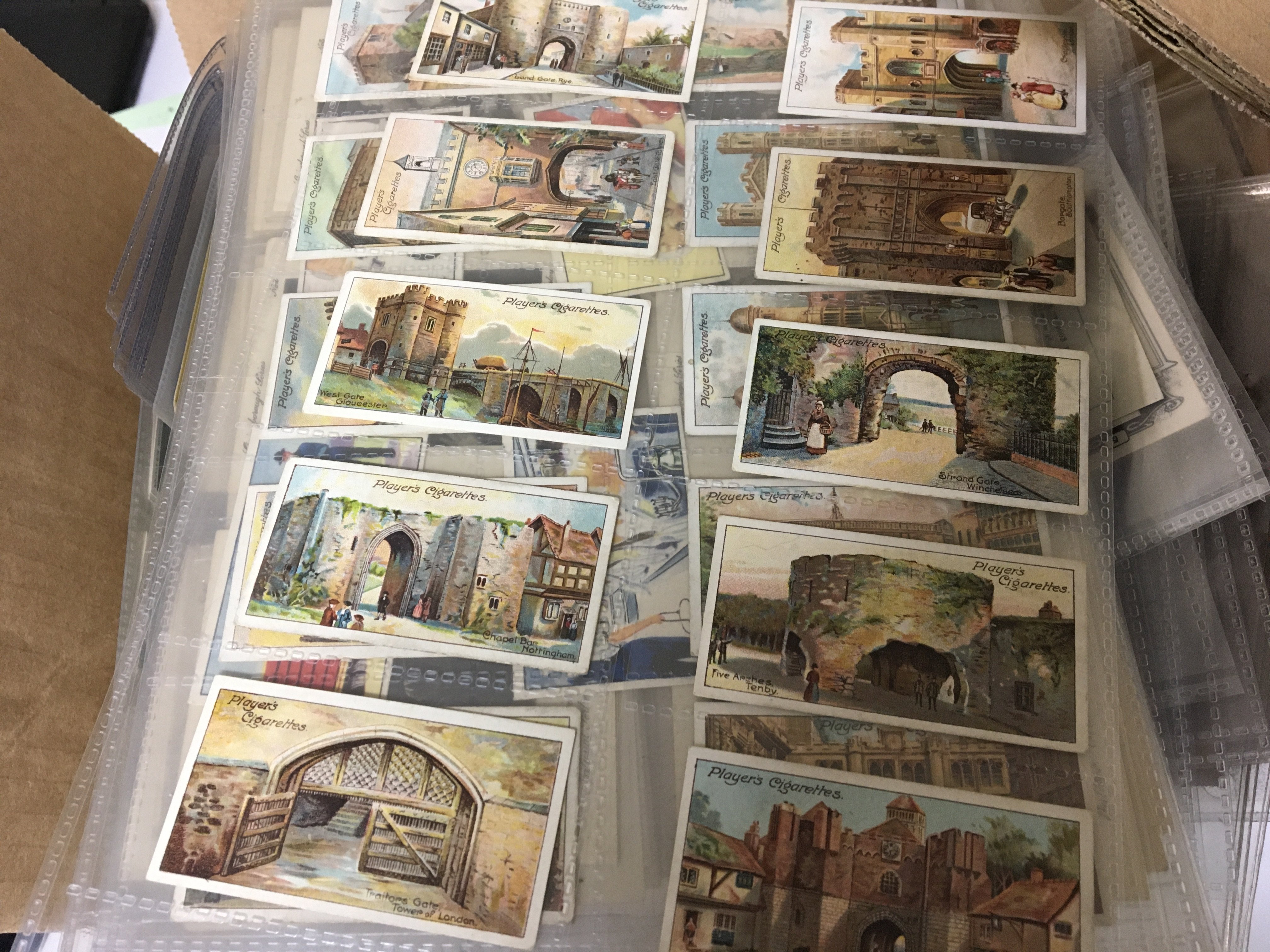 A box containing a large collection of Vintage cigarette cards well presented in plastic sleeves and numerous other loose part sets and sets