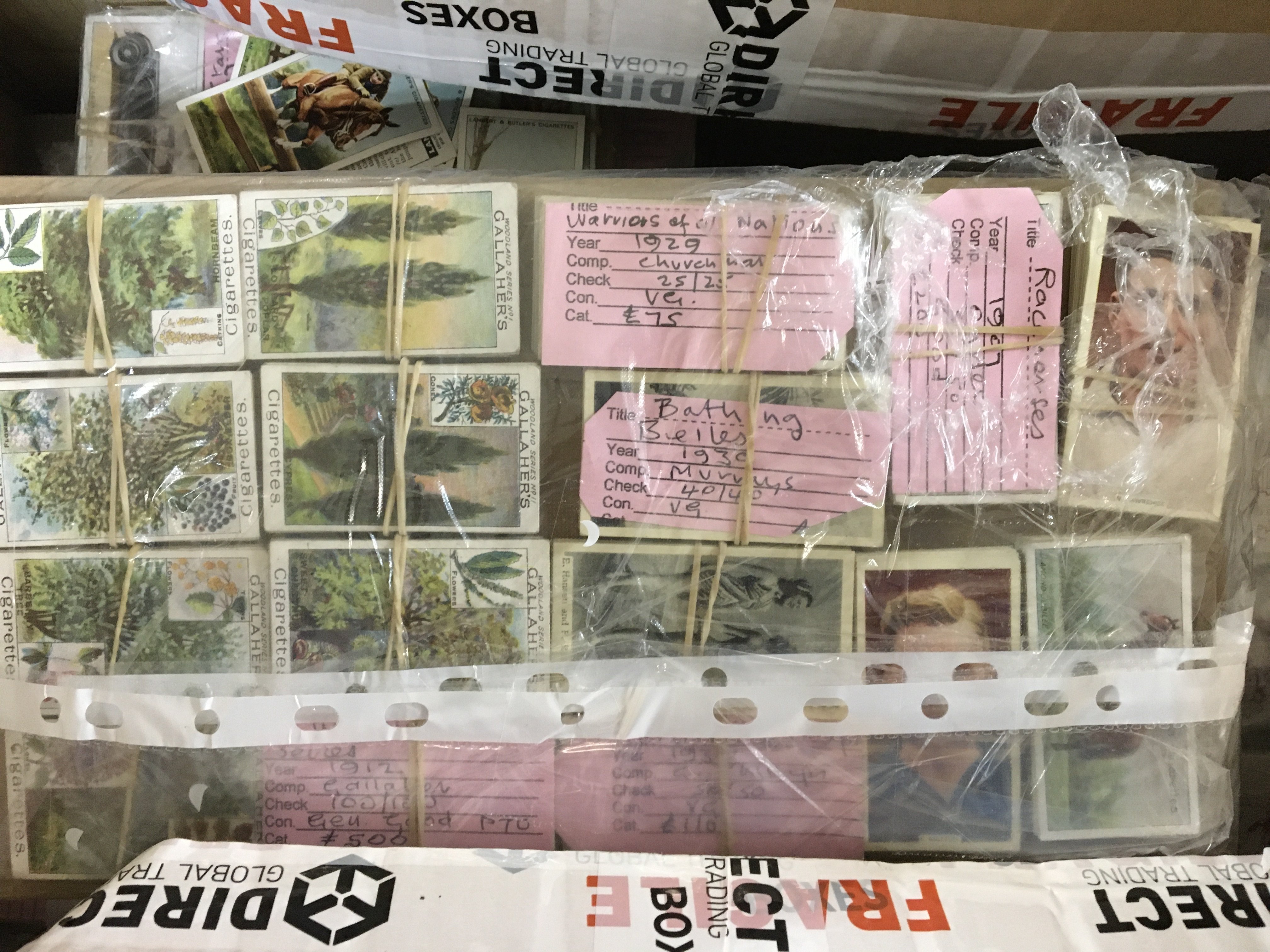 A box containing a large quantity of vintage cigarette cards mainly complete sets.with both sales price and catalogue values.