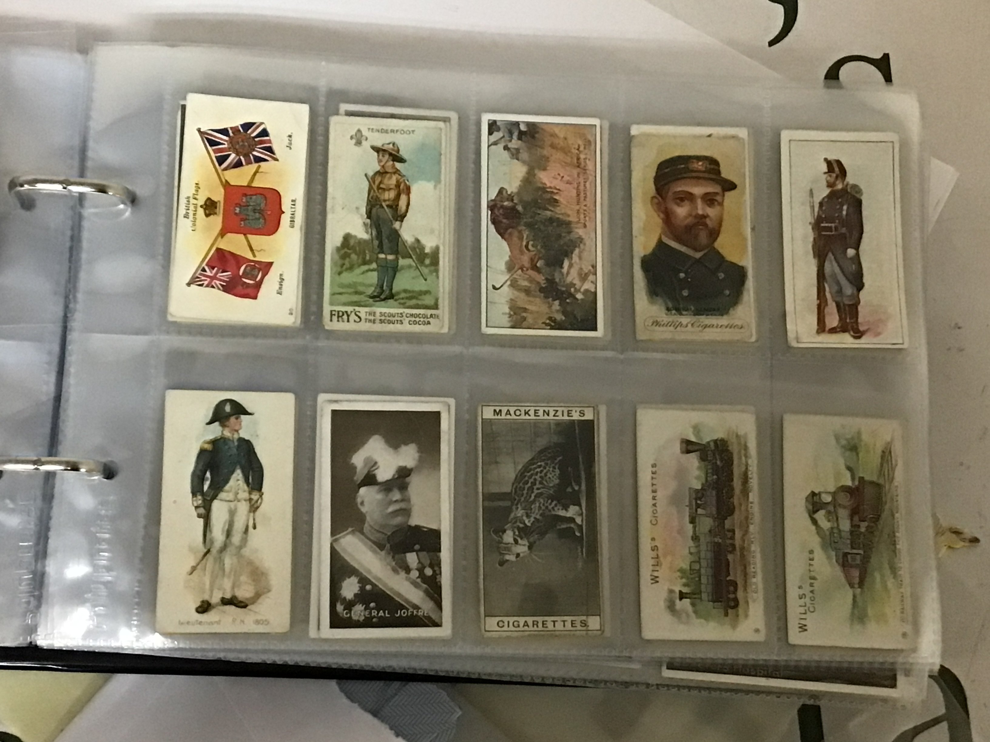 Six albums containing a good collection of Vintage cigarette cards and including an album containing match box covers. The Vintage cigarette cards including a few Taddy &Co Series One Admirals & Generals. Large size Richard Benson Cards Early Ogdens cigarette cards and many more (6)