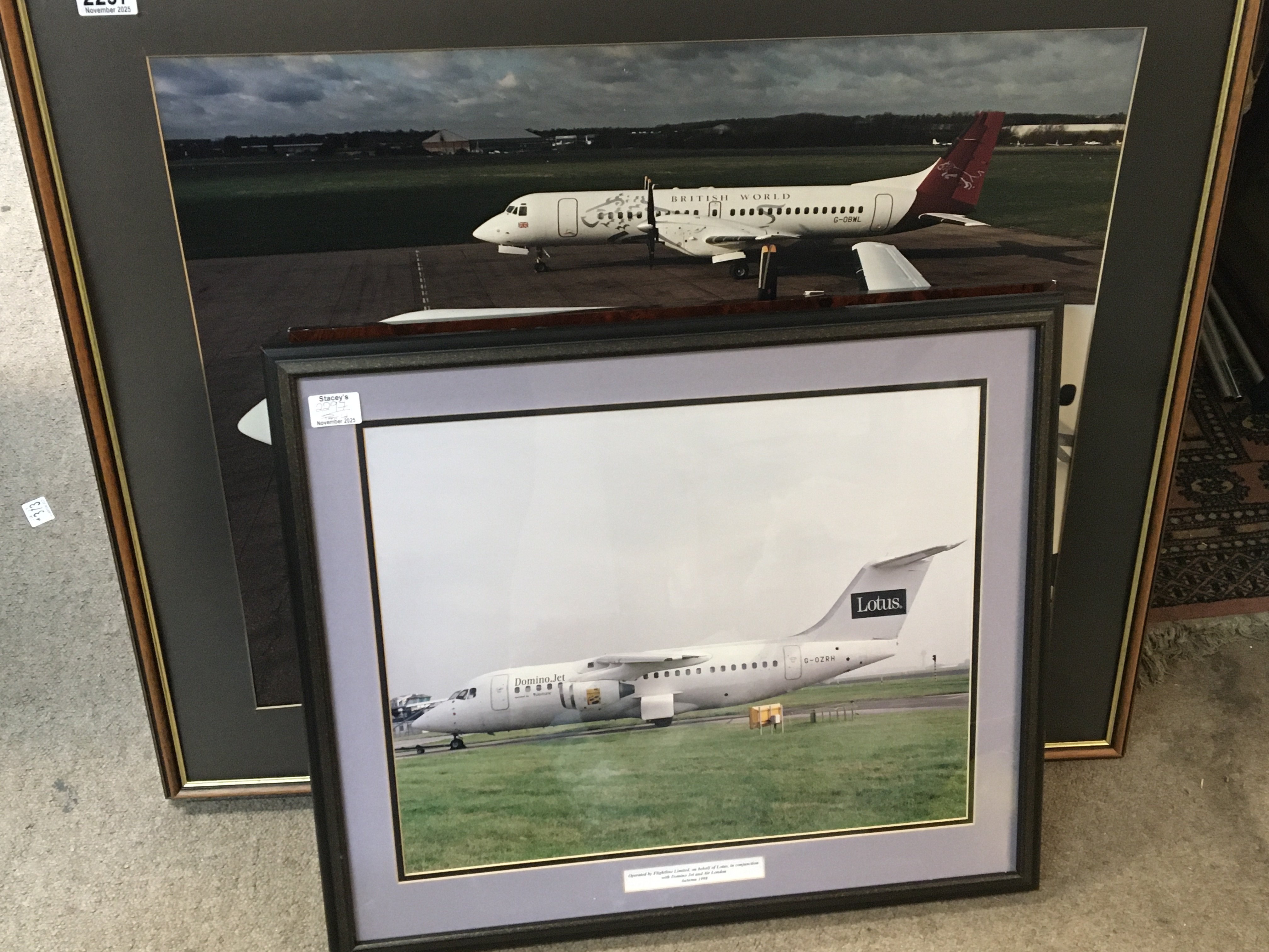 A collection of framed Commercial Aircraft photos and other unframed conforming pictures.