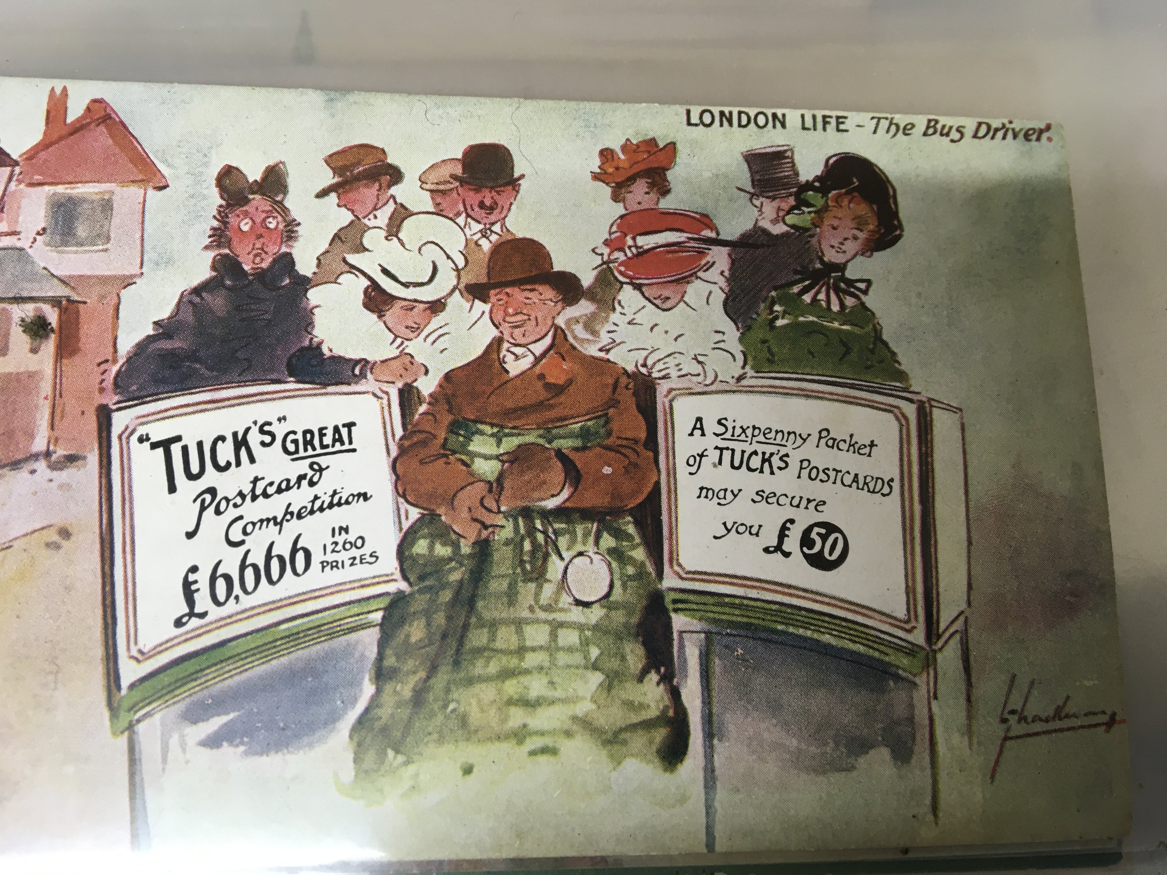 A box containing numerous albums containing mixed theme Edwardian and later postcards in approximately sixteen albums. Including many Tuck cards