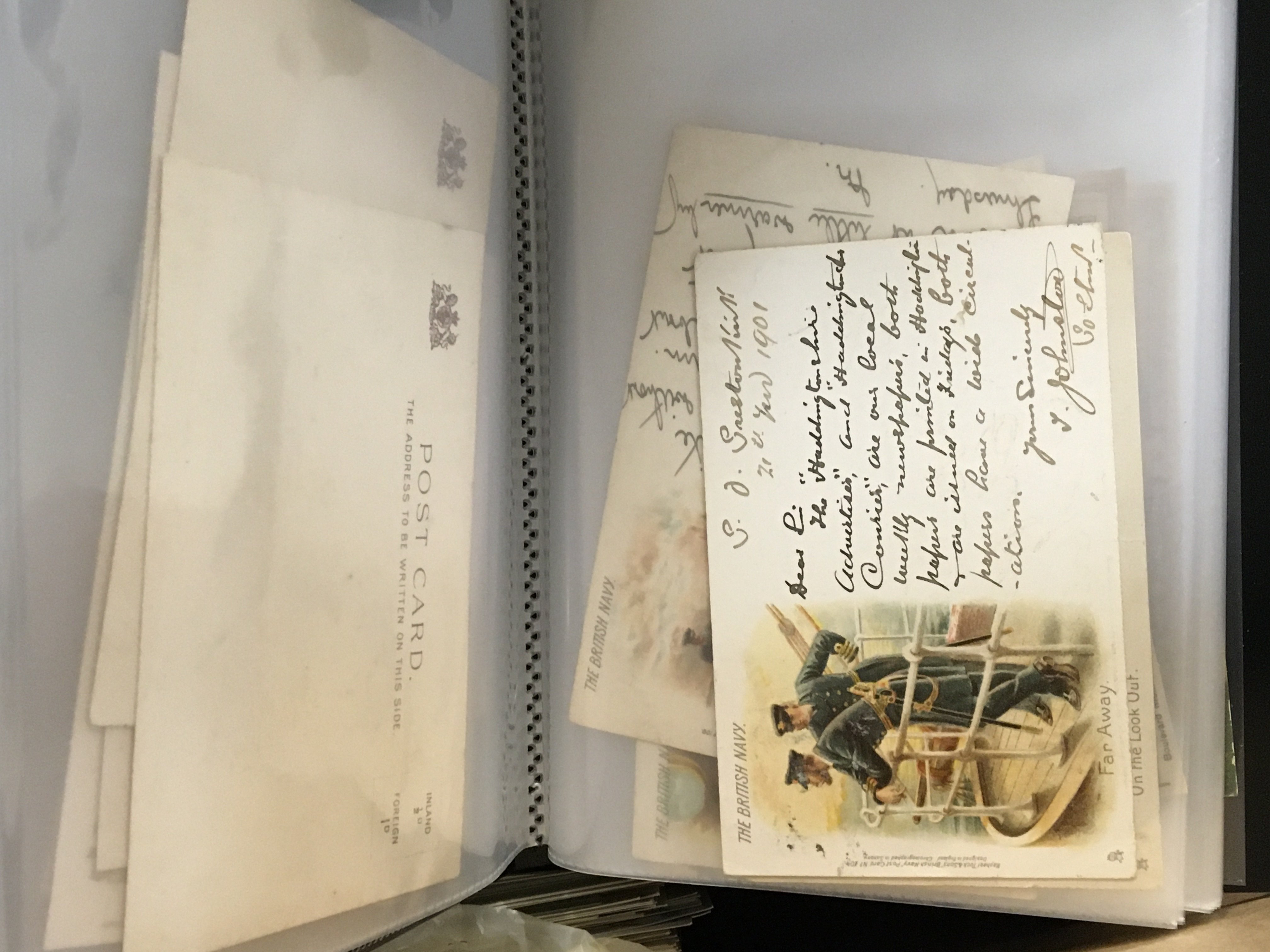 A box containing a quantity of albums of Vintage postcards approximately twelve albums and some loose cards.