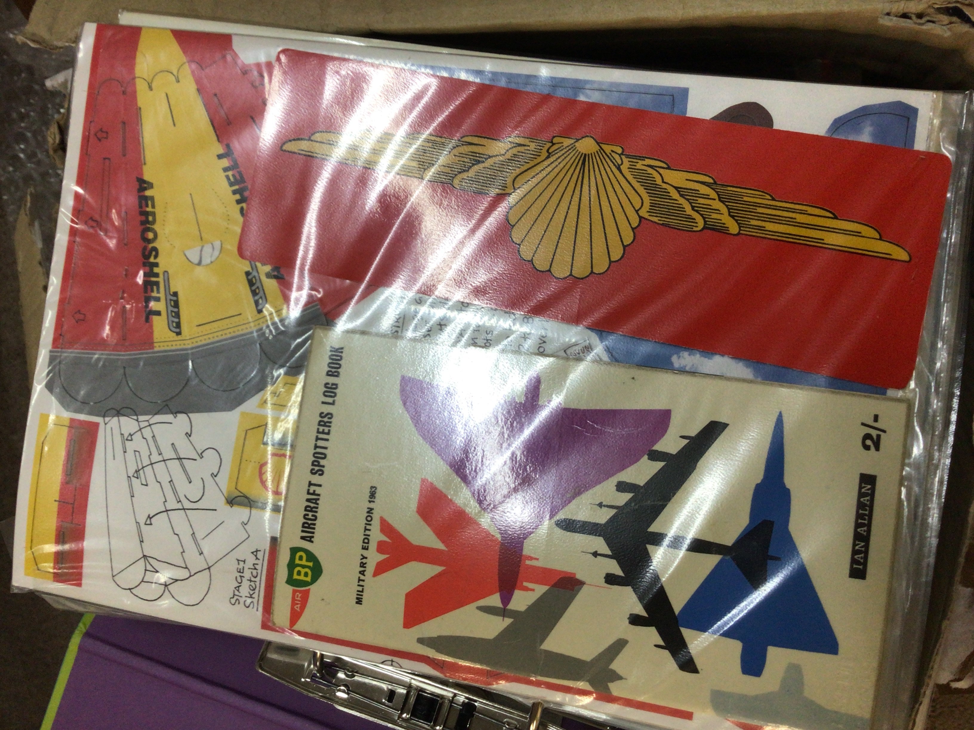 A box containing a quantity of British and other Airline information pamphlets from the 1960-1990 onwards.