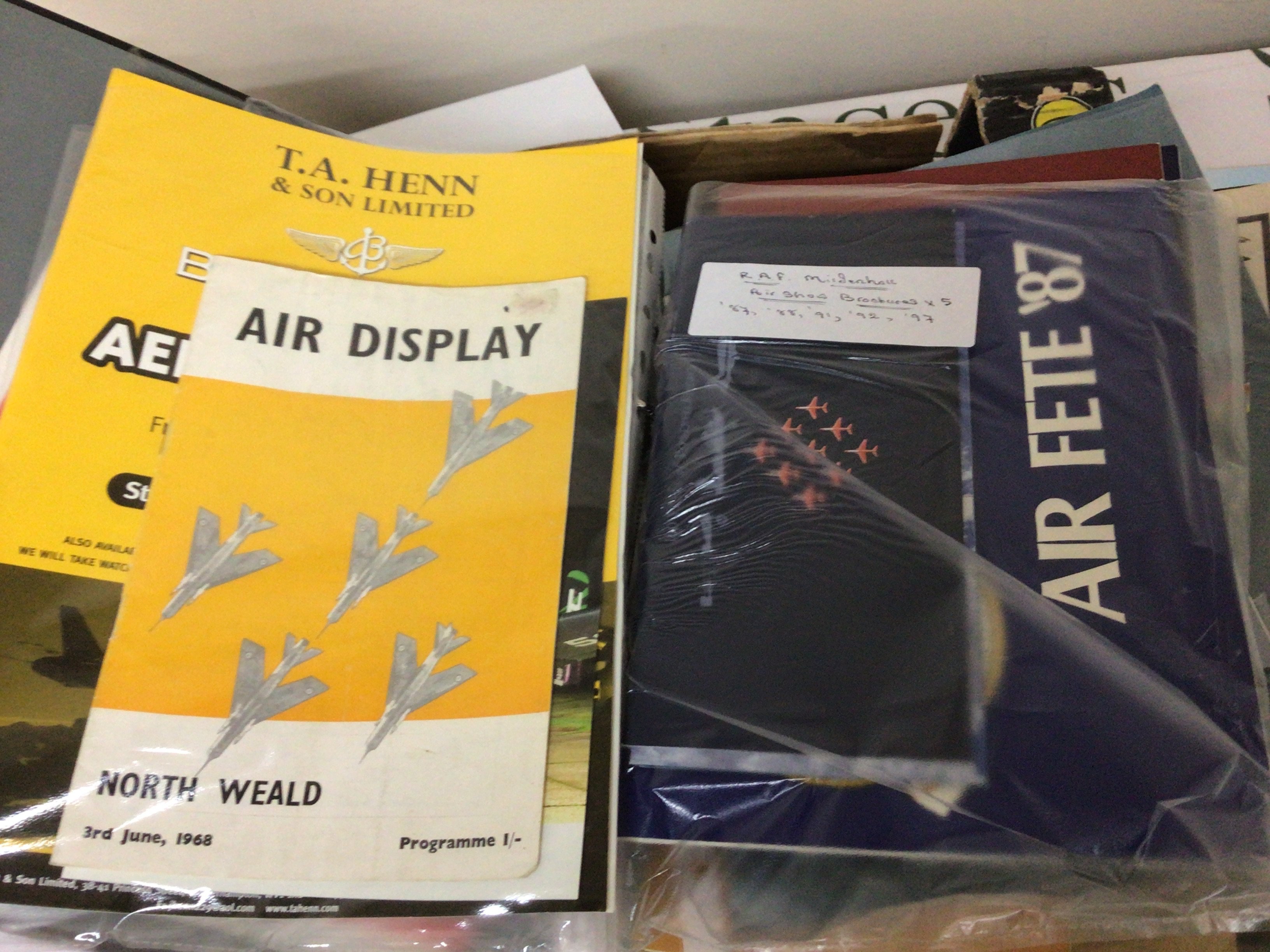 A box containing a collection of Vintage Aircraft Display programs from the 1960 onwards and other related ephemera.