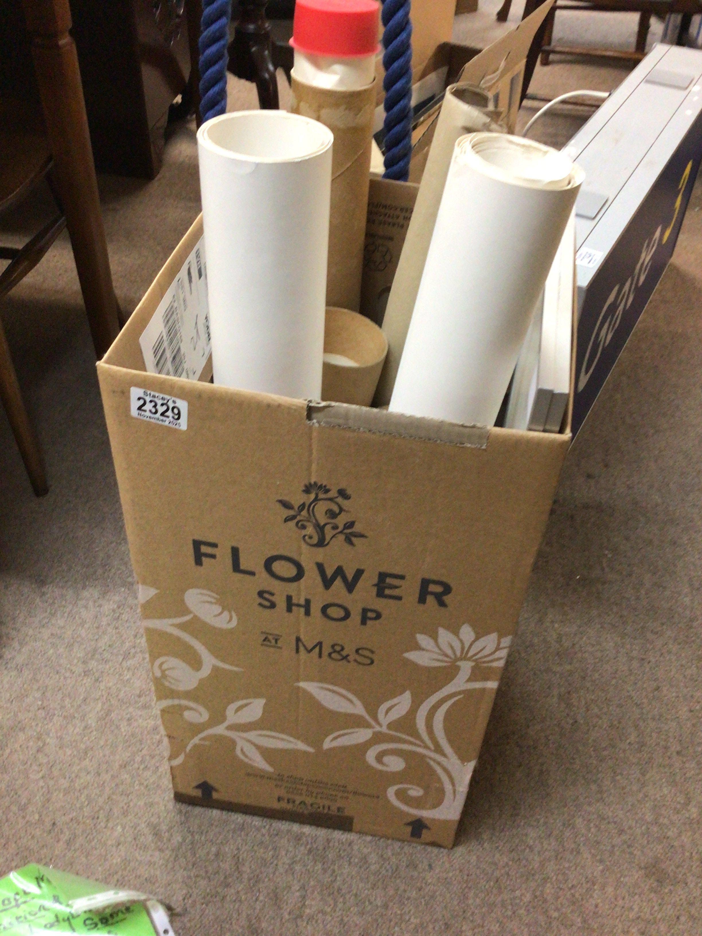 A box containing a collection of Aviation posters.