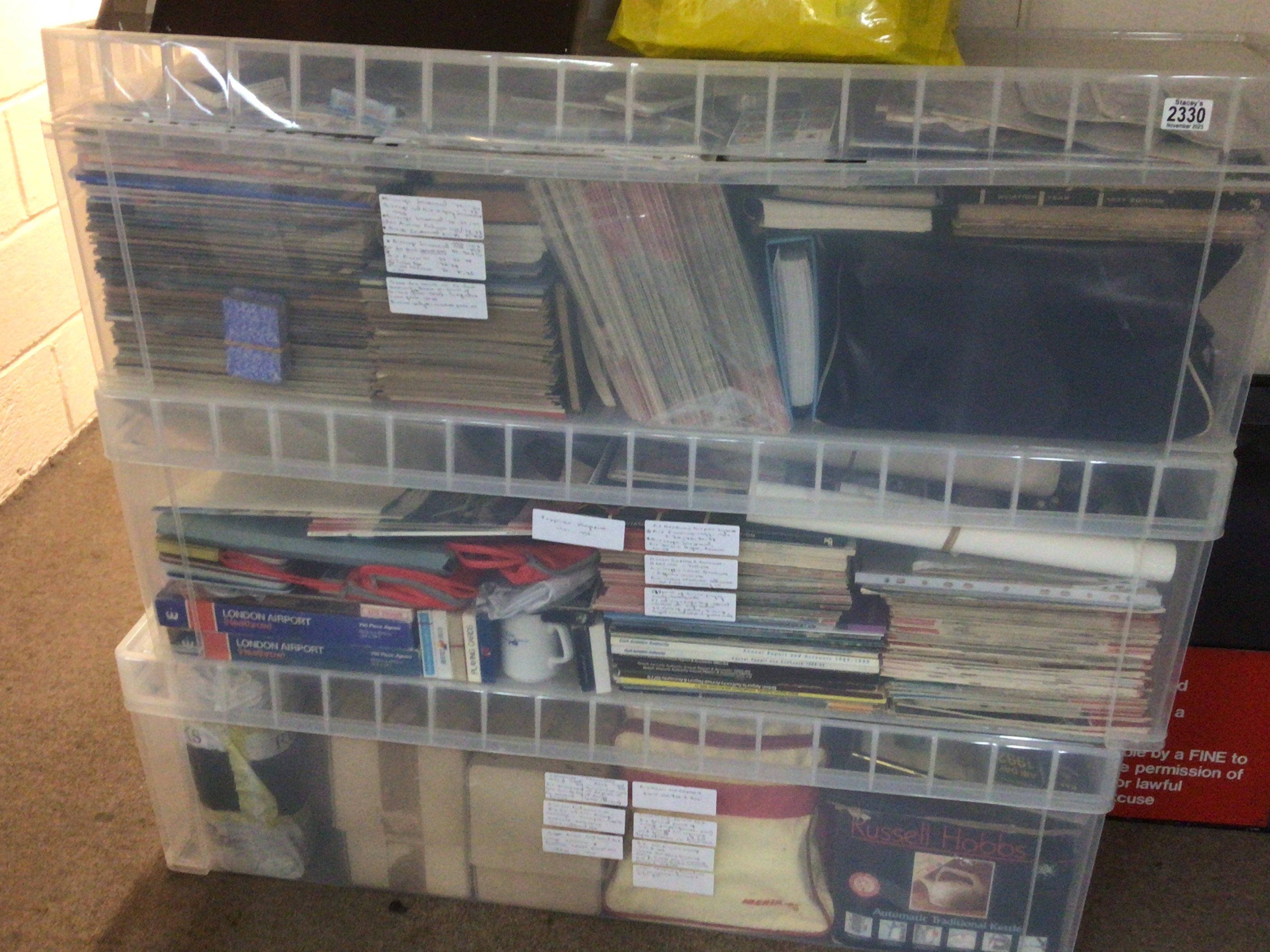 Three boxes containing Aviation memorabilia Vintage airbags magazines and others.