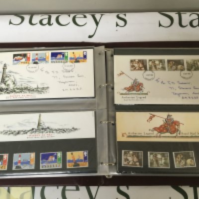 A collection of fourteen albums of First Day covers with Elizabeth II Pictorial presentation packs. (14)