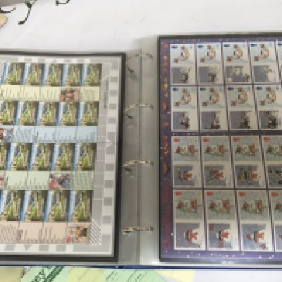 An album containing excess of 70 British Royal Mail Pictorial stamp sheets predominantly First class each sheet with 10 or more stamps some double sheets. All in very good unused condition.