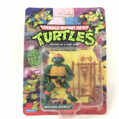 A Carded Playmates Teenage Mutant Hero Turtles Michelangelo. Unpunched.