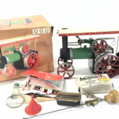 A Boxed Mamod Steam Tractor.
