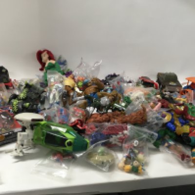 A large collection of assorted play figures ..vehicles etc. includes Star Wars..Spider-Man..Fantastic Four plus others.