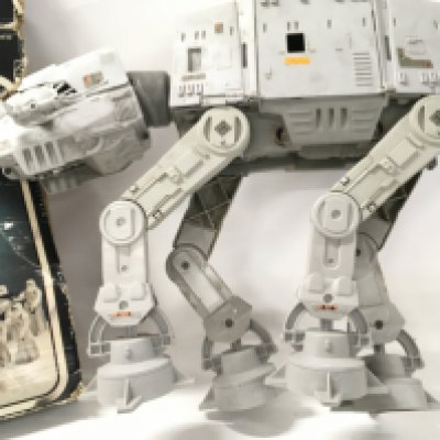 Vintage Star Wars AT-AT in worn box. Has one chin gun.