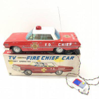 A Boxed Japanese Tin Plate Battery Operated Fire Chief Car.