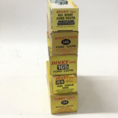 A collection of of 5 boxed diecast model cars by Dinky includes No. 143 a Ford Capri.. No.165 a Ford Capri..No.169 a Ford Corsair 2000e..No.194 a Bentley Coupe and ref011541 a Spanish Ford Fiesta.