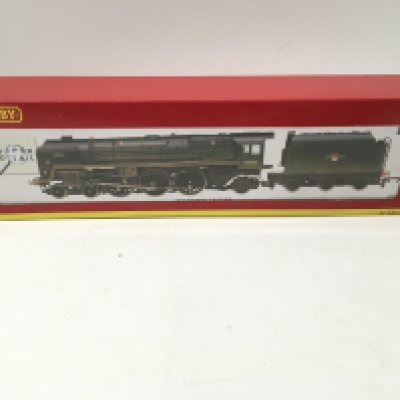 A boxed 00 gauge model locomotive with tender by Hornby. R 2457. BR 4.6.2. Britannia Class loco. Anzac weathered. DCC ready. No reserve