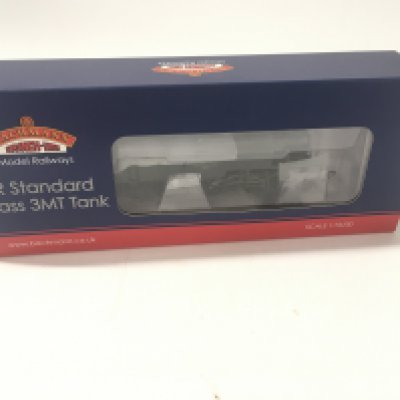 A boxed 00 gauge model locomotive by bachmann 31.980. BR Standard Class 3MT 82020. BR green late crest weathered. 8DCC. No reserve