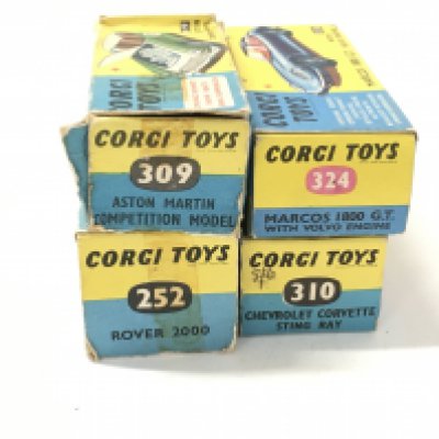 A collection of 4 boxed diecast model cars by Corgi includes No252 a Rover 2000..No309 a Aston Martin competition model..No310 a Chevrolet Corvette Stingray and No324 a Marcos 1800 GT with Volvo engine.