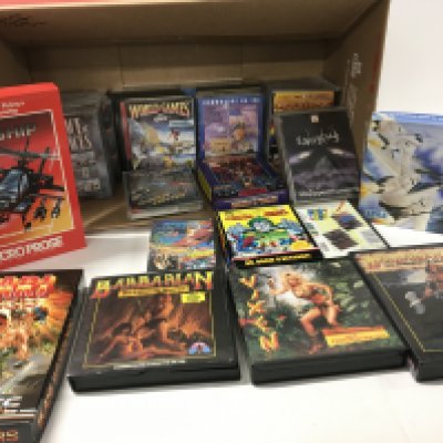 A collection in excess of 30 boxed games for Commodore 64.
