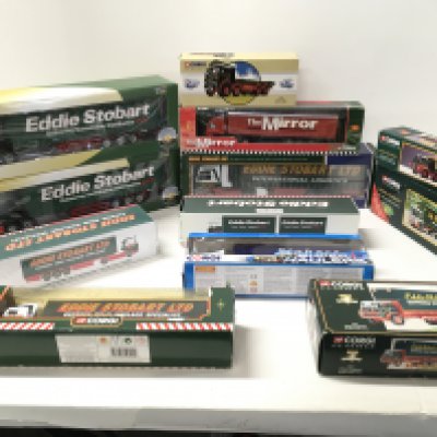A collection of of 12 assorted boxed Commercial vehicles all themed Eddie Stobart. Manufacturers include Corgi..Oxford..Cararama.