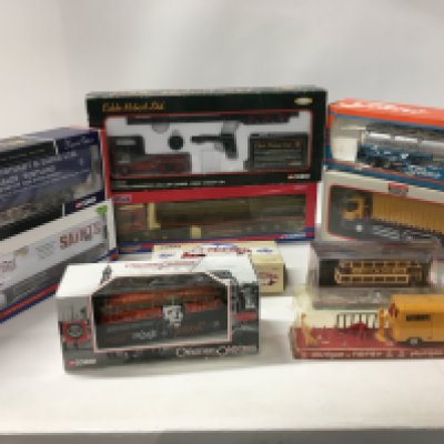 An assorted collection of 10 boxed model vehicles commercial or trams etc. Manufacturers include Corgi..Tekno etc. no reserve