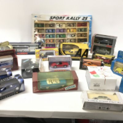 An assorted collection of model cars from several different manufacturers including Trofeu..Solido.. Vitesse..Matchbox..Trax etc. includes a boxed set of 25 cars entitled Sports Rally 25 possibly from 1970s.. all vehicles are boxed. No reserve