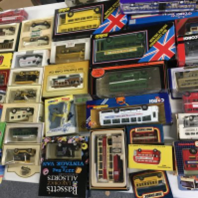 A collection in excess of 50 model vehicles including buses.cars and commercial mostly boxed in the original packaging.