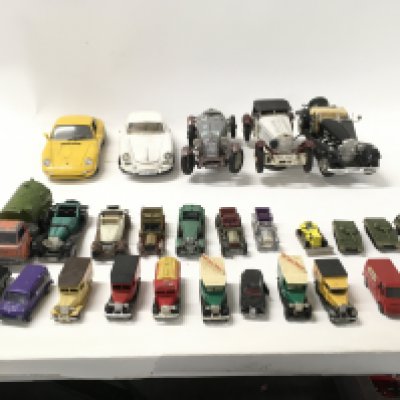A collection of Playworn model vehicles from various manufacturers including burago..Dinky..Corgi etc. No reserve.