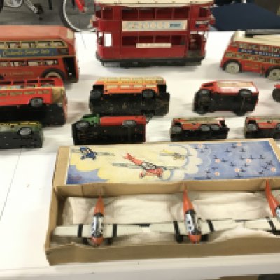 A collection of mainly clockwork tin plate toys by various manufacturers including from Gescha DRGM.. Triang..Wells etc includes buses and a set of 3 formation flying planes. Some keys missing.
