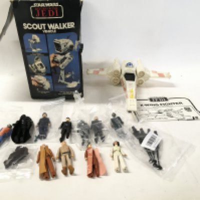 A collection of vintage Star Wars figures and vehicles including a scout Walker with box.