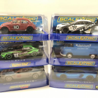 6 Boxed Scalextric Cars. A Volkswagen Beetle. A BMW Z4. A Aston Martin DBR9. A Bentley Continental GT3. A Volkswagen Panel Van T1b and a Lamborghini Aventador LP 700-4.